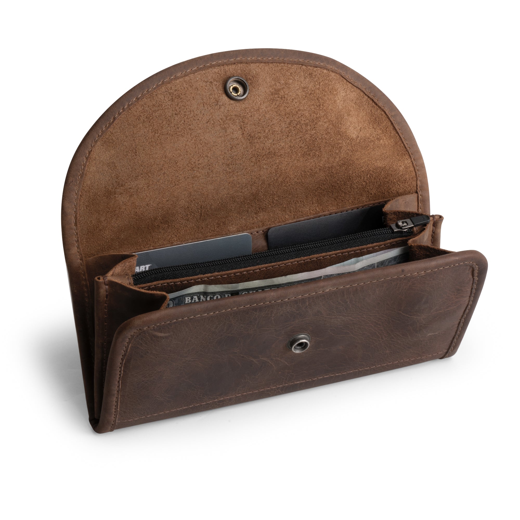 Inside view of the Single Snap Zippered Wallet by Hide & Drink, showcasing compartments for cards and a zippered pouch. This Snap Clutch Wallet for Women is a durable money holder and card organizer made from full grain leather, featuring small batch production, hand cut, and hand sewn details. Artisan crafted in La Antigua Guatemala.