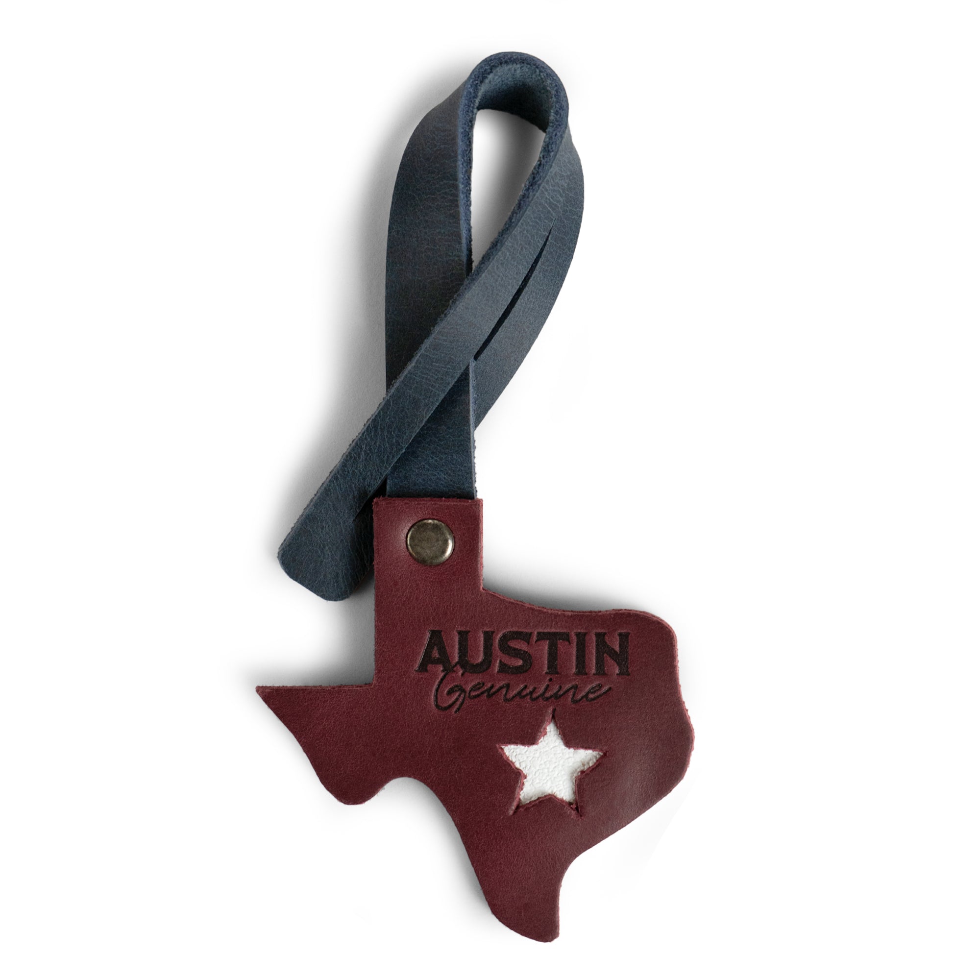Bag Charms by Austin Genuine shows a Texas-shaped leather charm with a star feature. This Austin Genuine Bag Charm showcases 7 unique designs made with full grain leather from StockyardX, crafted through small batch production, hand cut, hand sewn, and fire branded, artisan, handmade in La Antigua Guatemala & Oaxaca Mexico.