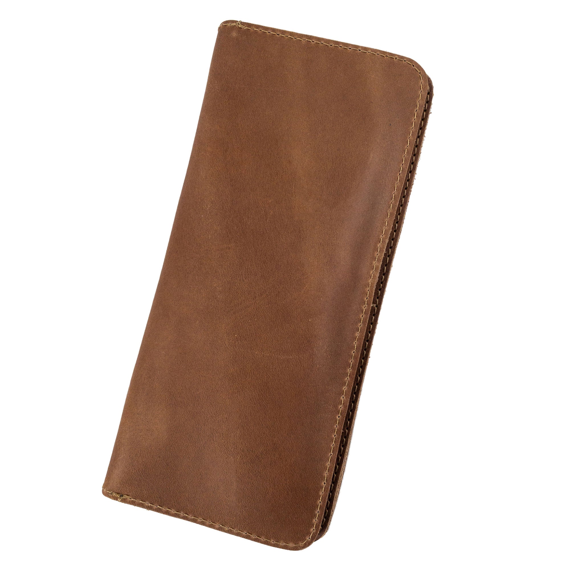 Open rustic bifold wallet for cellphone by Hide & Drink, showcasing compartments for cards and cash. This elegant Bifold Wallet for Cellphone is made of Full Grain Leather, ensuring durability and style. Discover the exquisite craftsmanship from small batch production in La Antigua Guatemala & Oaxaca Mexico.