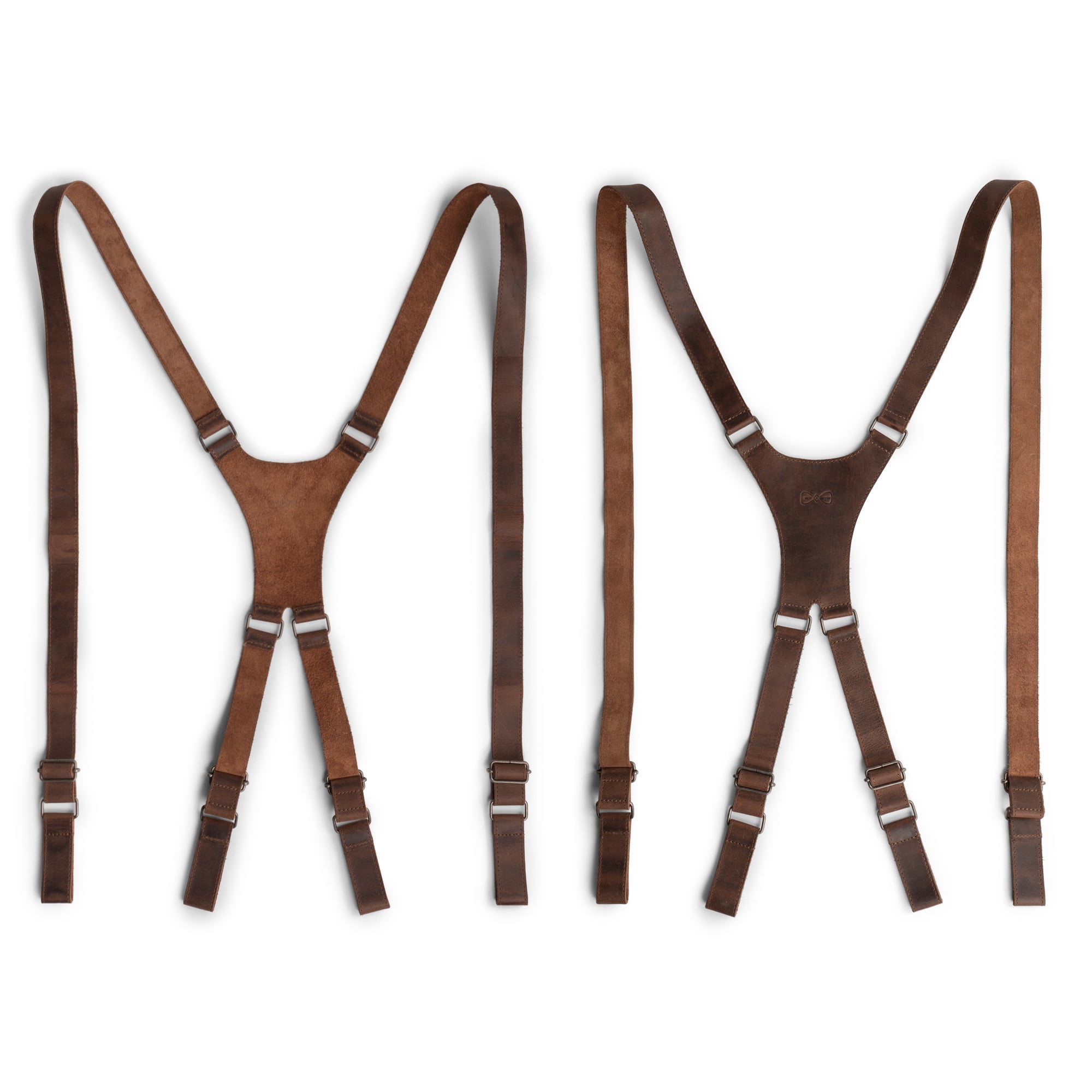 X Back Formal Suspenders by Hide & Groom; made from full grain leather, showcasing a classic Y shape with three hooks, ideal for weddings and formal events. These handmade suspenders offer shoulder support and are a perfect wedding accessory for grooms. Crafted with small batch production techniques, hand cut, hand sewn and fire branded for durability by artisans in La Antigua Guatemala.