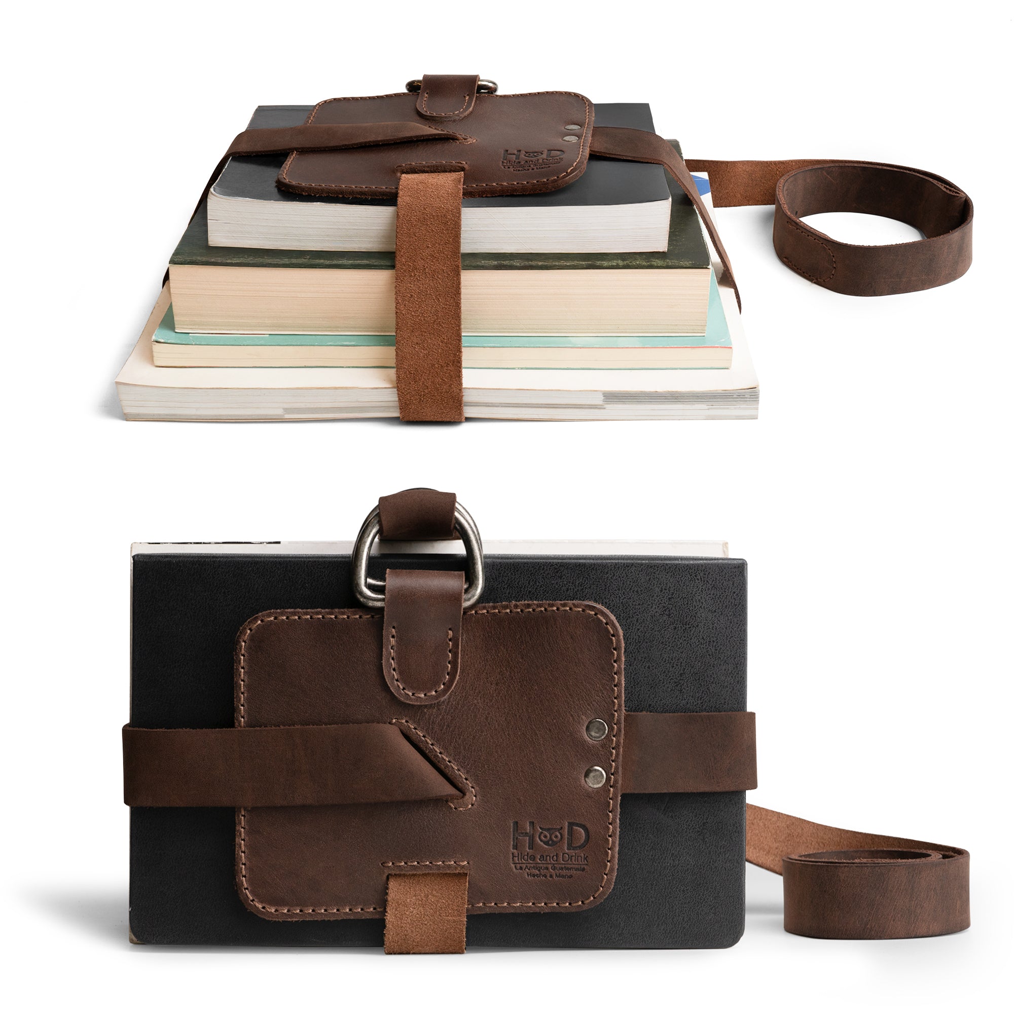 Hide & Drink Book Strap Carrier displayed with books, showcasing its adjustable and stylish design. This Full Grain Leather accessory is perfect for shoulder carrying and promoting reading. Ideal for those who appreciate artisan, handmade products from La Antigua Guatemala.