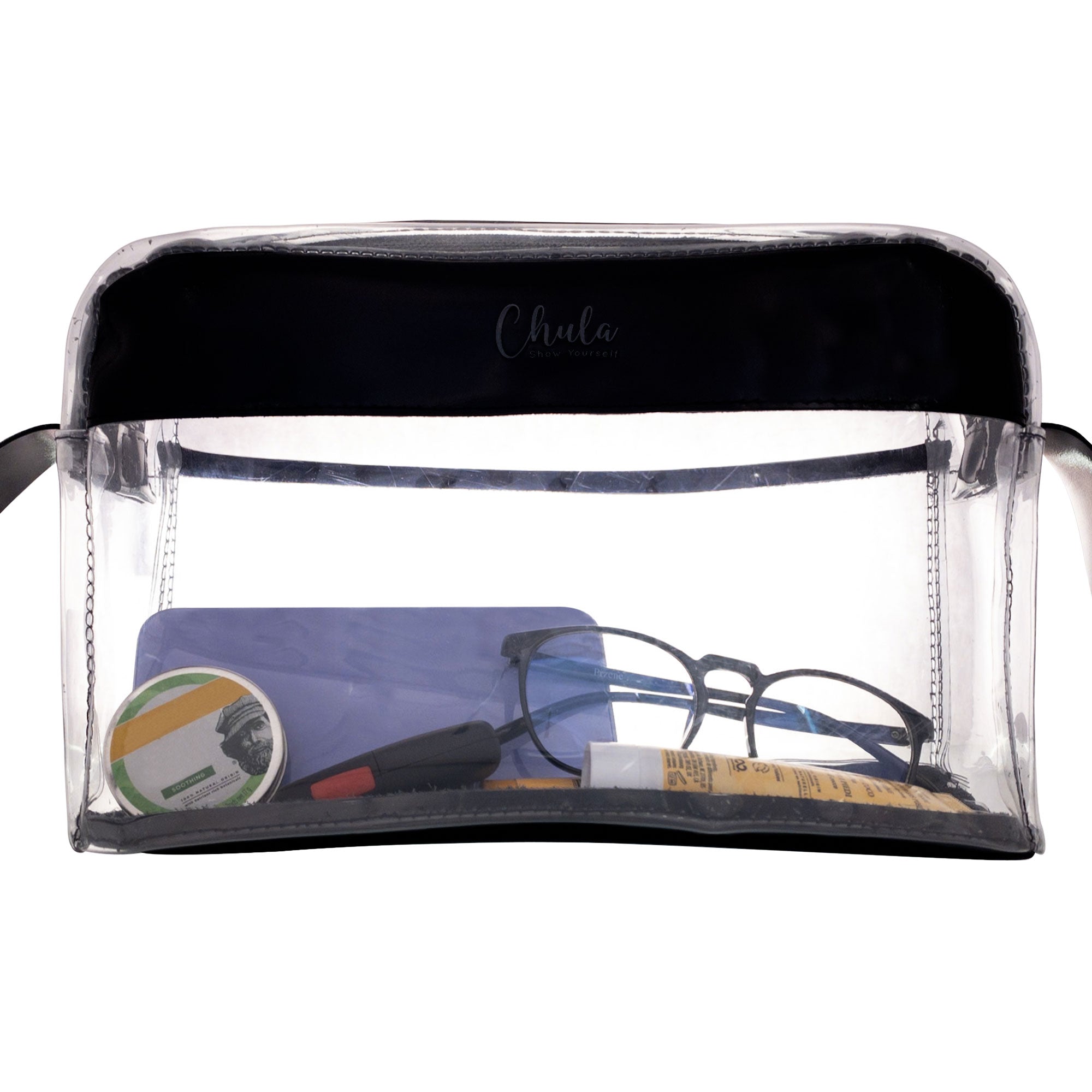 Chula's Rectangular Shoulder Bag with Coin Pouch displayed with essentials inside, showcasing the PVC material and full grain leather craftsmanship. Rectangular Shoulder Bag with Coin Pouch Included, Crossbody Bag with Adjustable Strap, Messenger Bag, StockyardX, Small Batch Production, Hand Cut, Hand Sewn, Fire Branded, Artisan, Handmade in La Antigua Guatemala & Oaxaca Mexico.