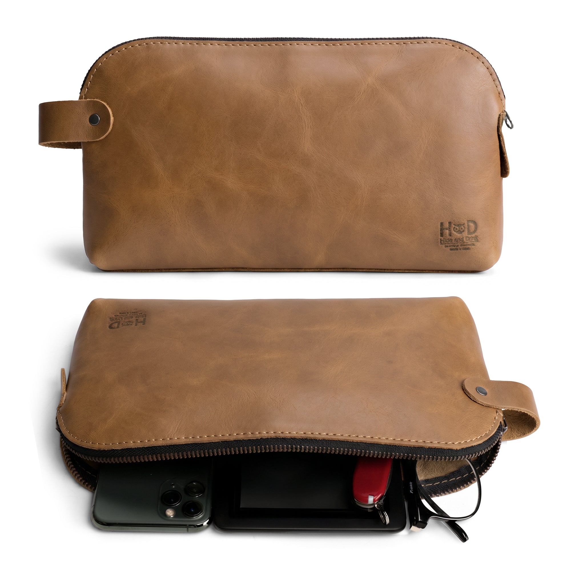 Dopp Kit Utility Bag by Hide & Drink demonstrating a sleek, stylish design with practical uses. This unique Dopp Kit Utility Bag serves as a multi-purpose bag made from full grain leather exemplifying small batch artisan craftsmanship, handmade in La Antigua Guatemala & Oaxaca Mexico.