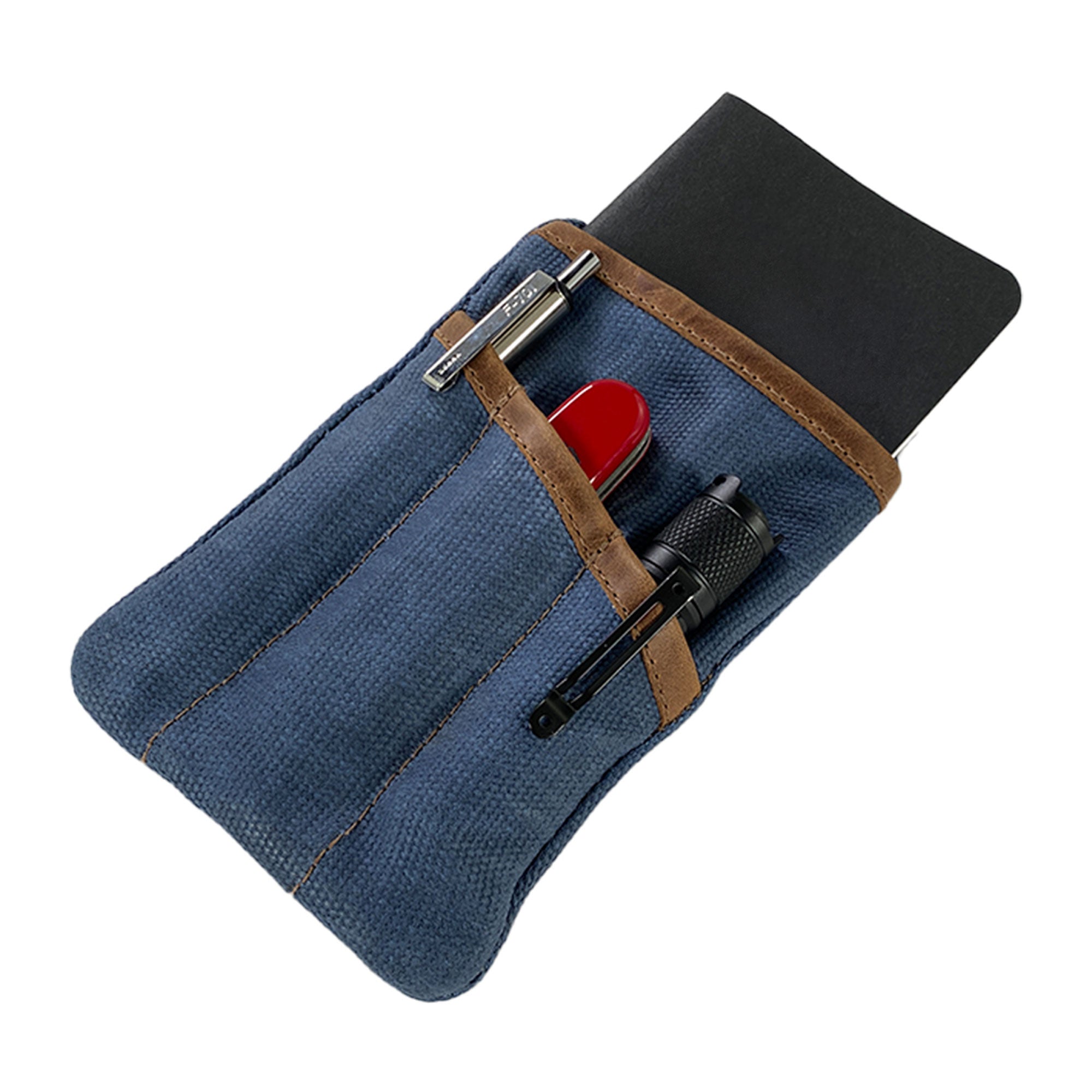 Multi-tool Pocket Pouch by Hide & Drink in blue, emphasizing its handcrafted details and waxed canvas material, designed as a functional camping tool case.