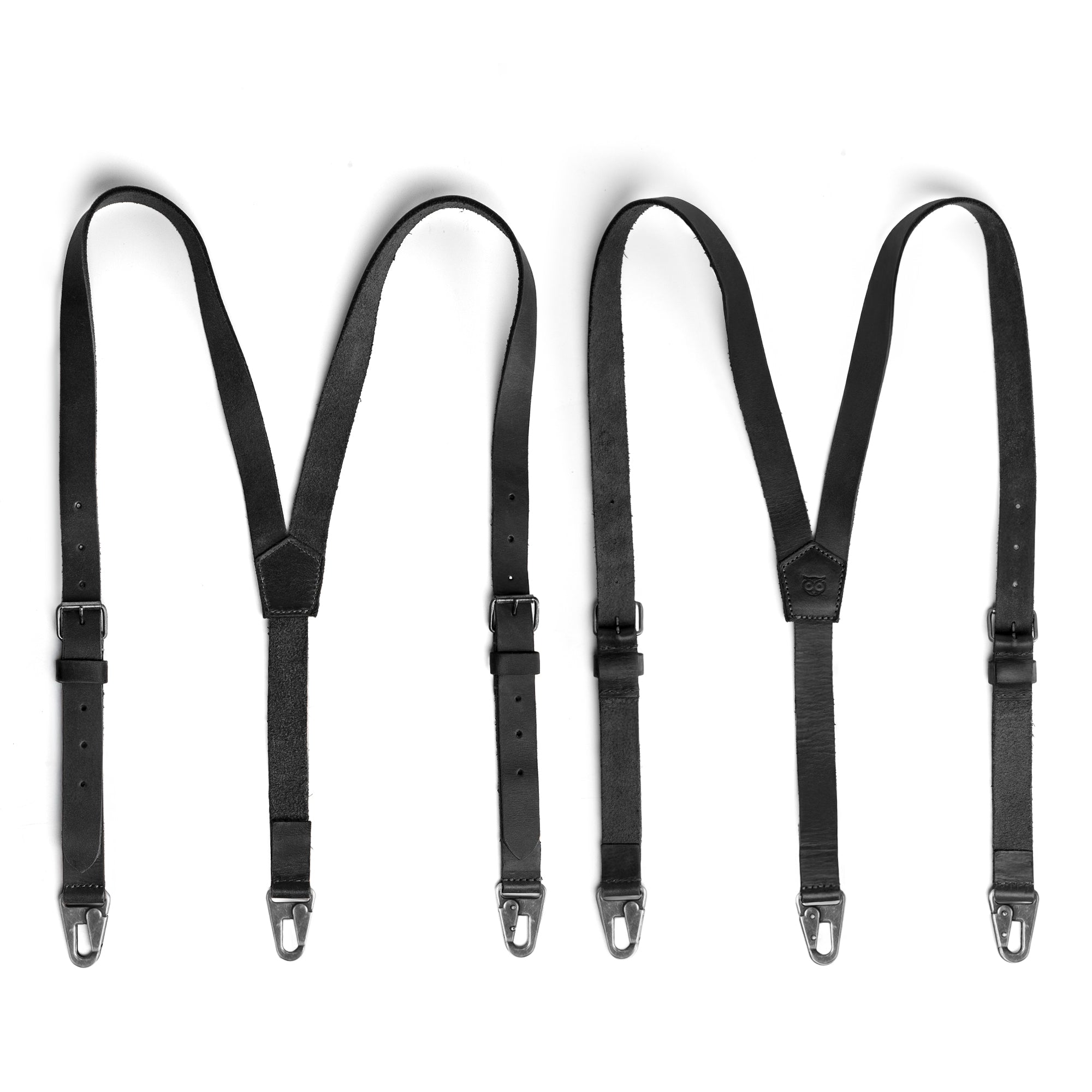 Hide & Drink Rustic Slim Suspenders in black leather, featuring an X back design that provides shoulder support for formal events. Perfect accessory for weddings, emphasizing handmade craftsmanship from Guatemala.