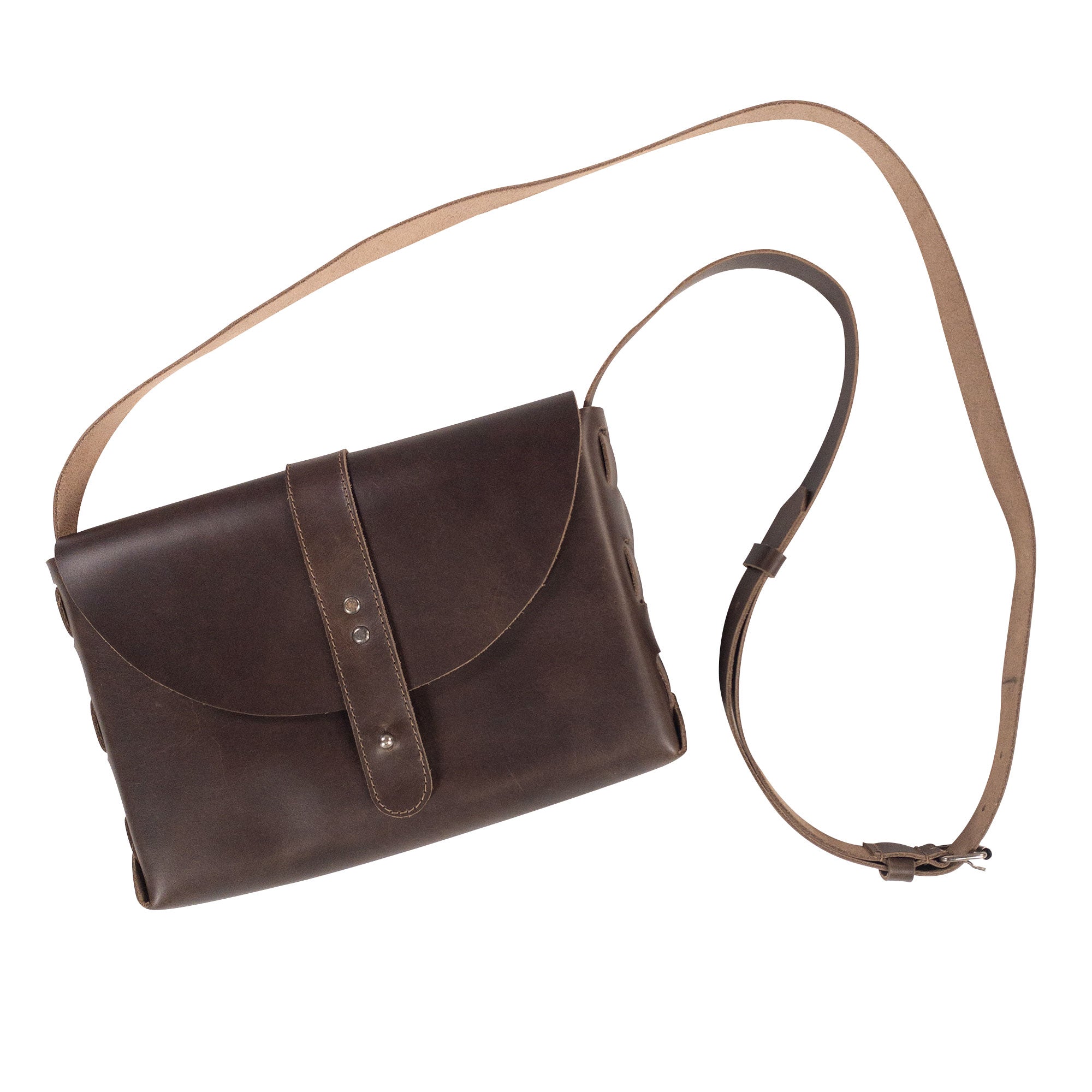 Vintage Leather Satchel by La Antigua, a classic rectangular shoulder bag with adjustable strap, showcasing full grain leather craftsmanship. This messenger bag exemplifies classic style with its hand cut and hand sewn details, ideal for daily use.