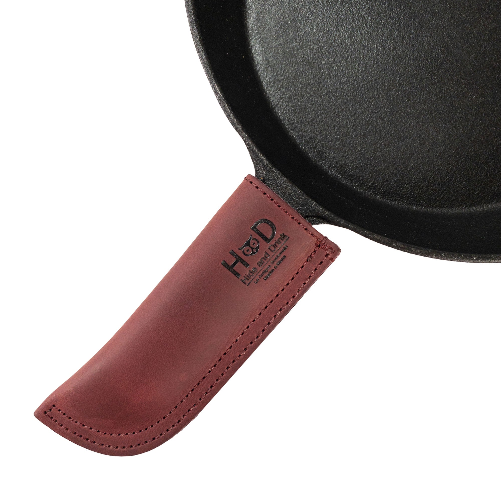 Hot Pan Handle Cover by Hide & Drink, perfect for enhancing grip on cast iron cookware while offering heat resistance, artisan-crafted in La Antigua Guatemala & Oaxaca Mexico.