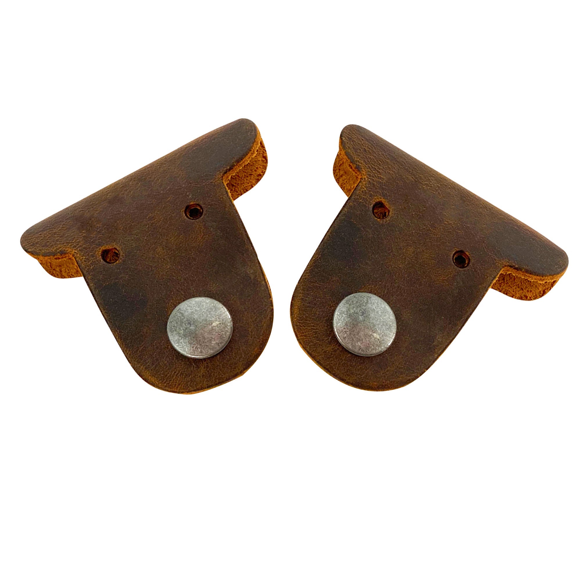 Two adorable Dog Cord Keepers by Taco Dog, perfect for wrapping up your headphones and chargers in style. Made of full grain leather, these handmade accessories feature clip snaps for easy management and travel. Get organized with this 2 pack of Dog Cord Keepers, featuring artisan craftsmanship from La Antigua Guatemala.