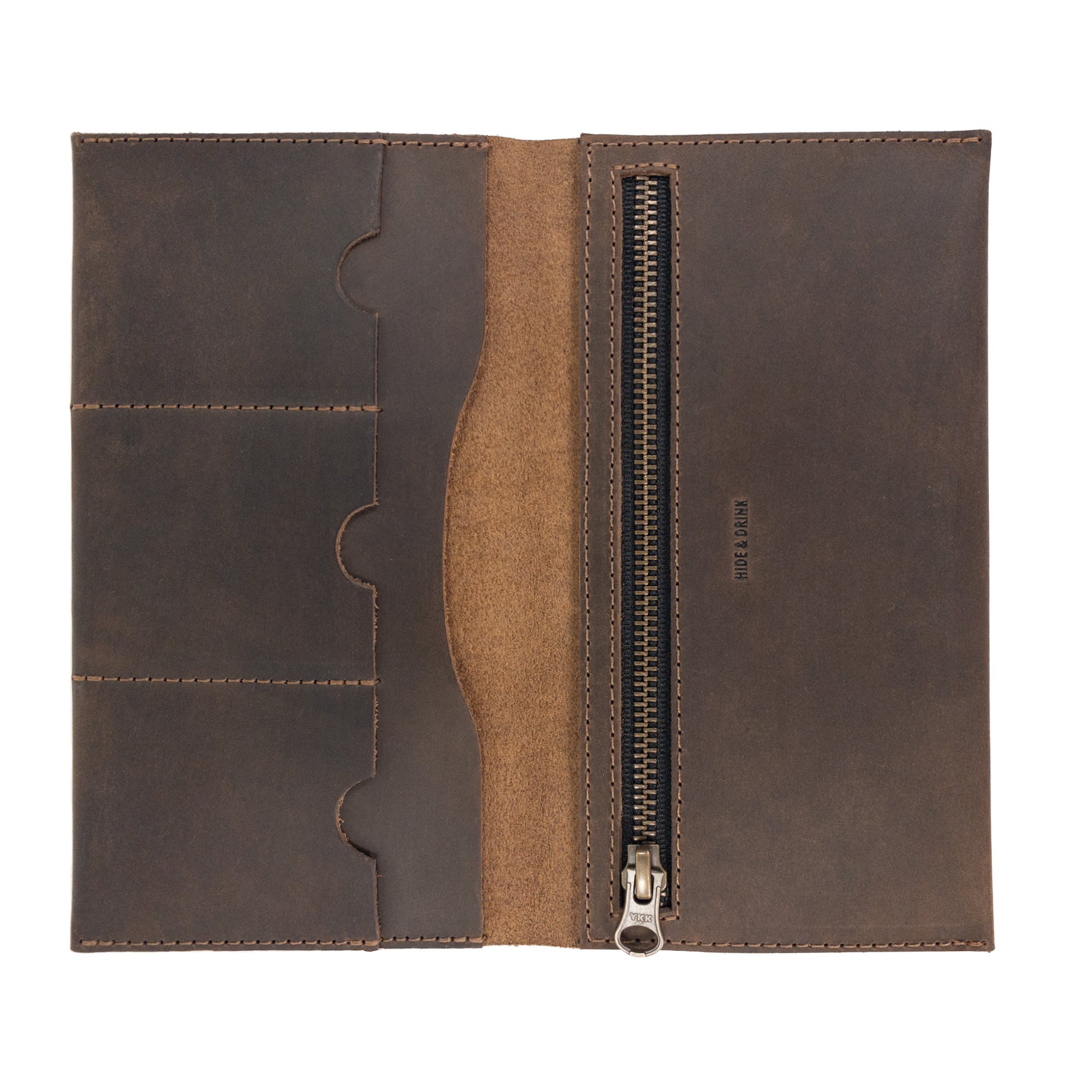 Open layout of the Hide & Drink Large Wallet for Passport with Credit Card Slots, displaying its full grain leather texture and several card slots, handmade in La Antigua Guatemala & Oaxaca Mexico.