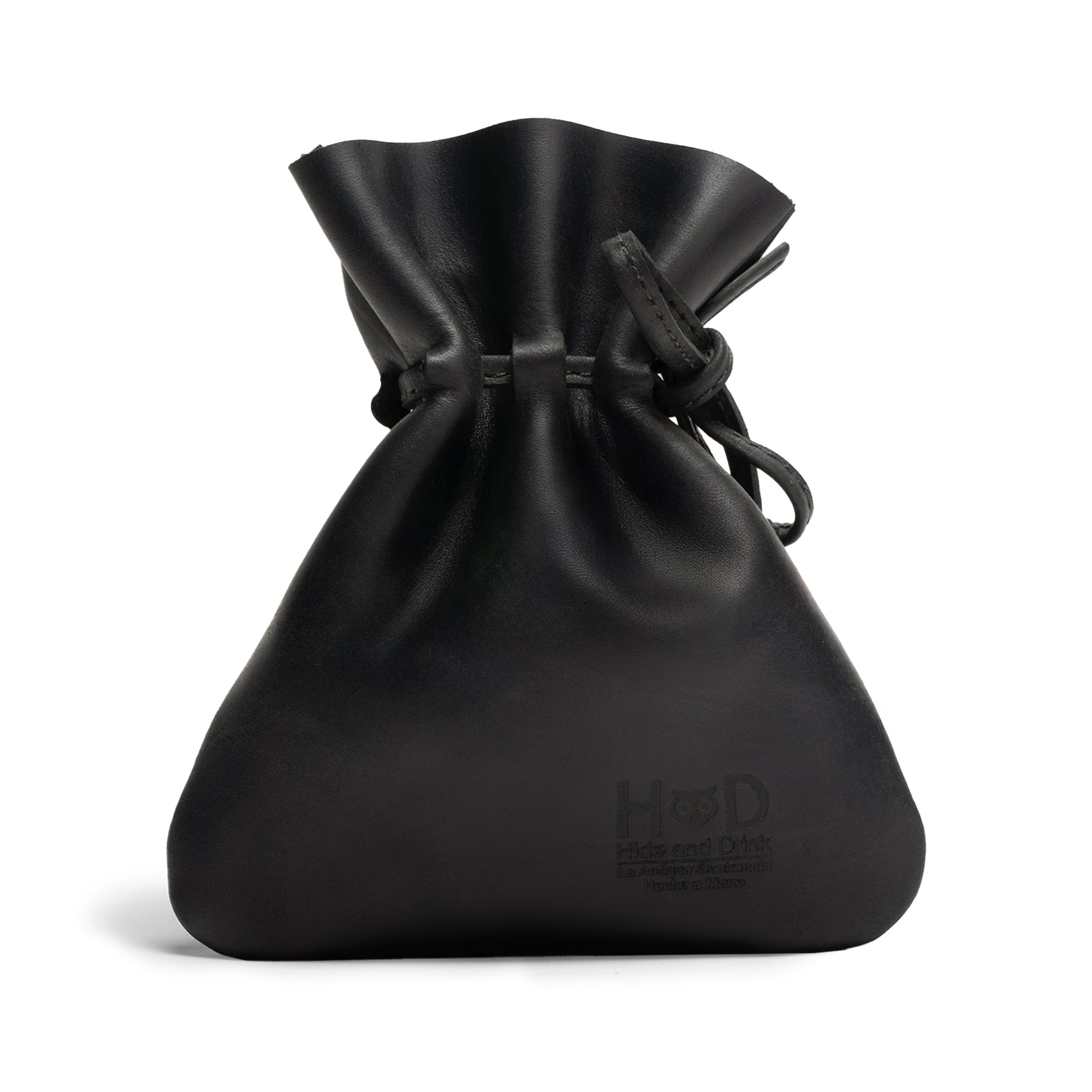 The sleek black version of the Medieval Coin Pouch by Hide & Drink offers a modern twist on a classic design. This Medieval Drawstring Coin Pouch is perfect for those looking for a vintage bag for cosplay while being made from durable Full Grain Leather through small batch production. Artisan-crafted in La Antigua Guatemala & Oaxaca Mexico.