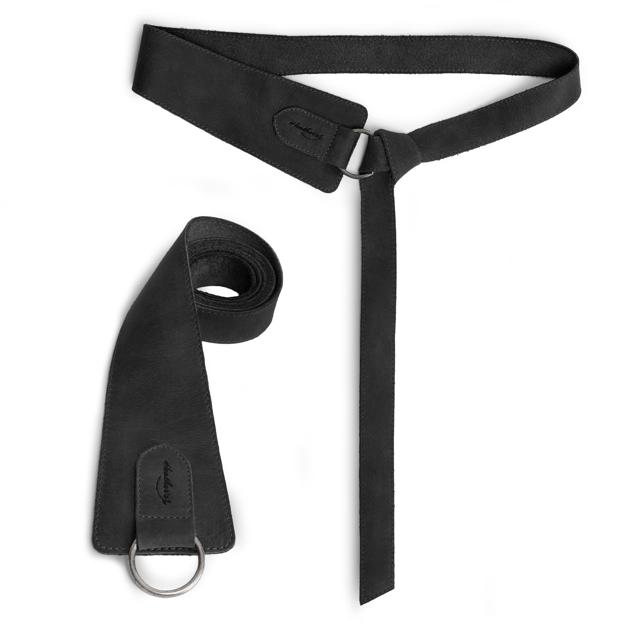 Heather's Formal Belt for Women with Ring in classic black, showcasing its elegant design. This handmade No-Buckle Belt serves as a stylish waist strap and belly accessory, crafted from durable Full Grain Leather and produced in small batches in La Antigua Guatemala.