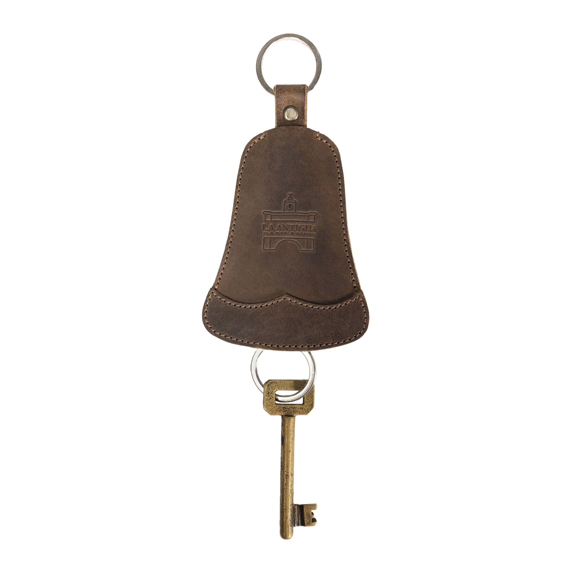 Bell Shape Keychain from La Antigua, featuring a stylish bell-shaped design as a keyring with strap. Perfect key organizer that allows you to easily attach to keys. Made from durable full grain leather, this artisan keychain holder showcases small batch production and is hand cut, hand sewn, and fire branded, handmade in La Antigua, Guatemala & Oaxaca, Mexico.