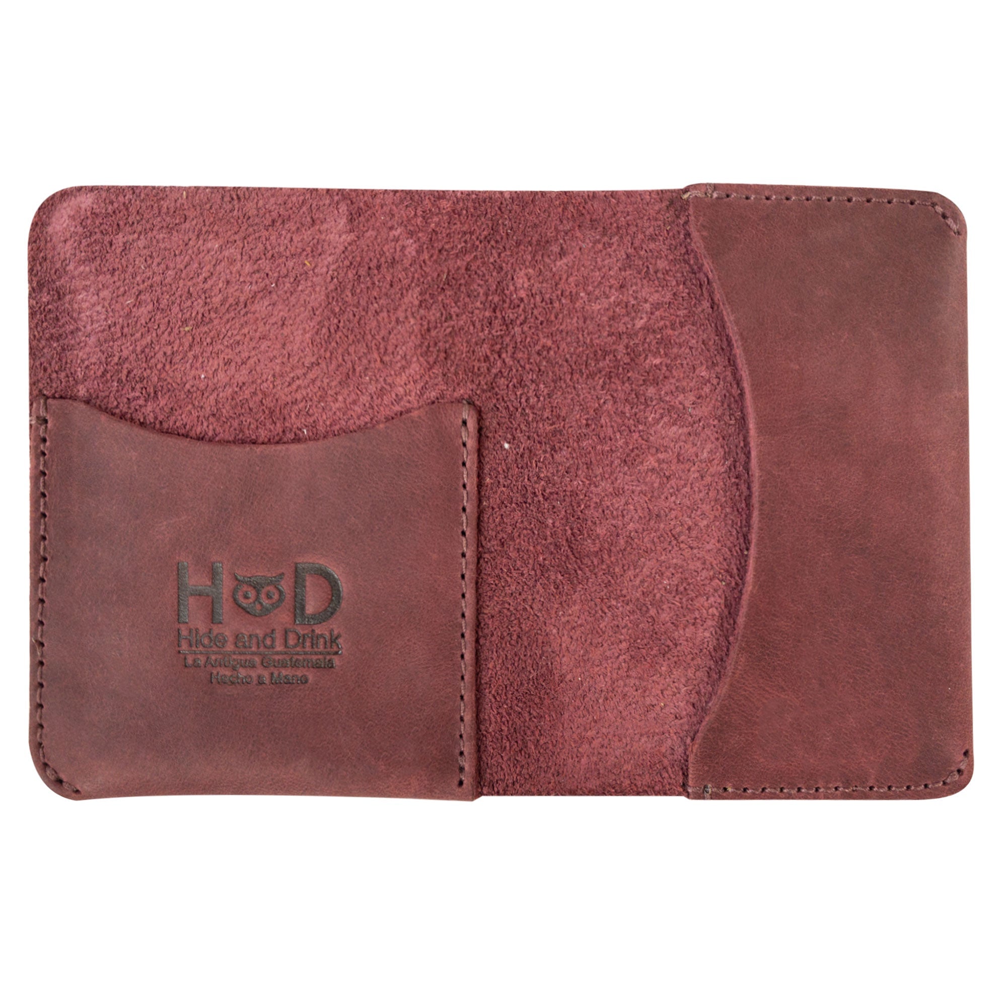 An exterior shot of Hide & Drink's Bifold Slim Card Holder demonstrating its sleek and stylish design. Ideal for credit card storage, this wallet is not only a minimalist cash case but also handmade from full grain leather in La Antigua Guatemala.