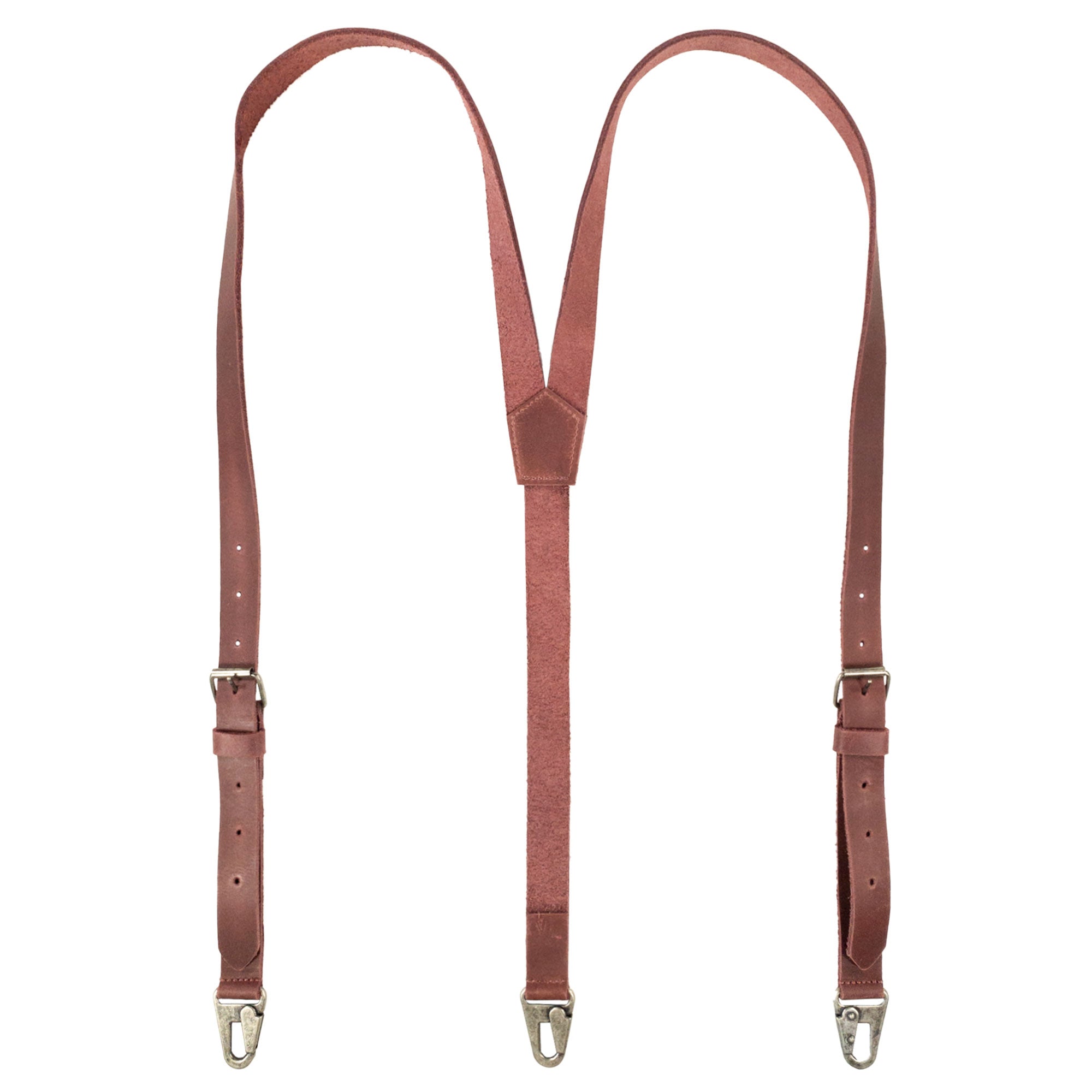 Hide & Drink Rustic Slim Suspenders displayed on a mannequin, crafted from rust colored leather. A stylish option for grooms, emphasizing shoulder support and elegance.