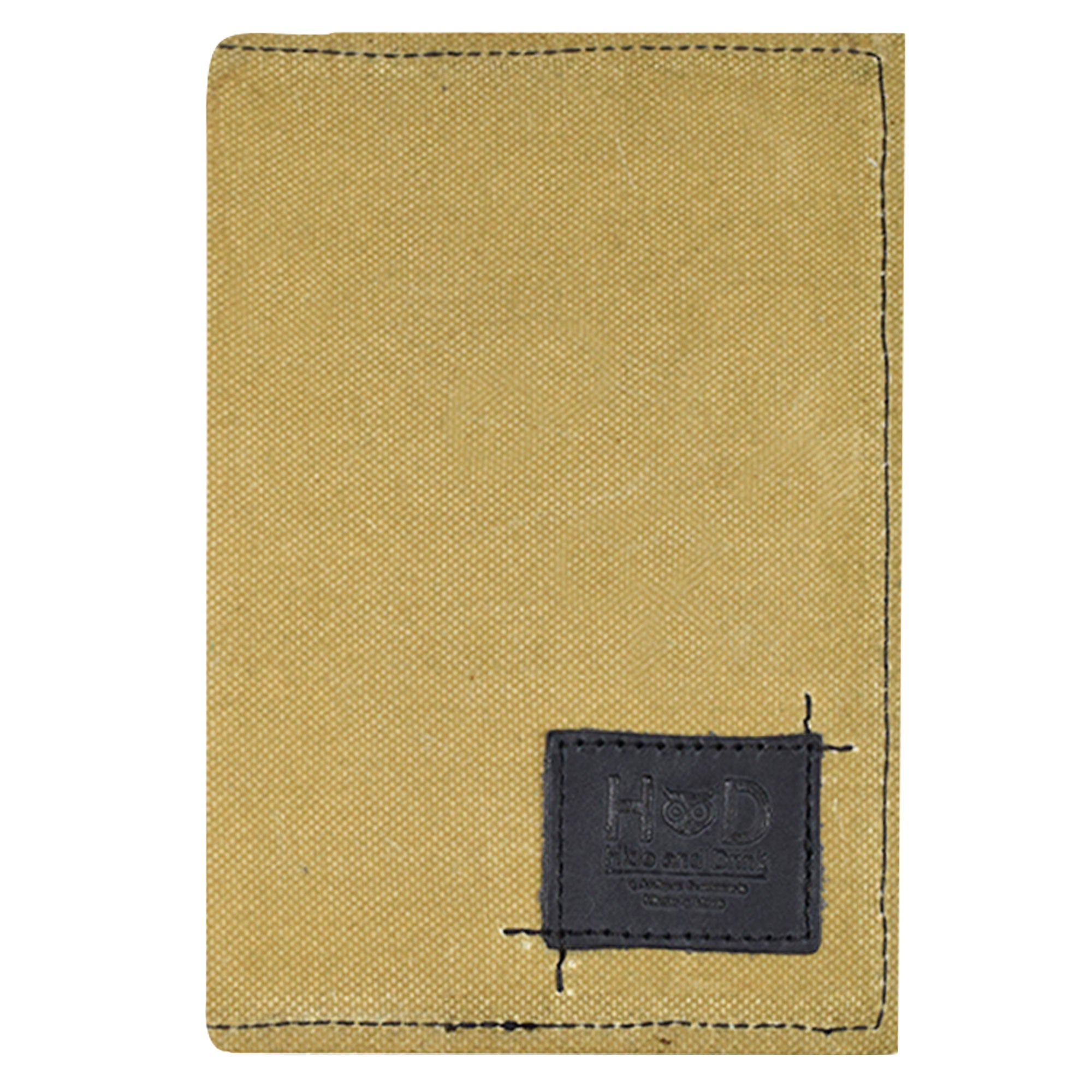 Hide & Drink Waxed Canvas Field Notes Cover from a different angle, revealing its smart design for easy access to notes and cards. This journal cover serves multiple purposes, from organizing field notes to acting as a practical wallet.