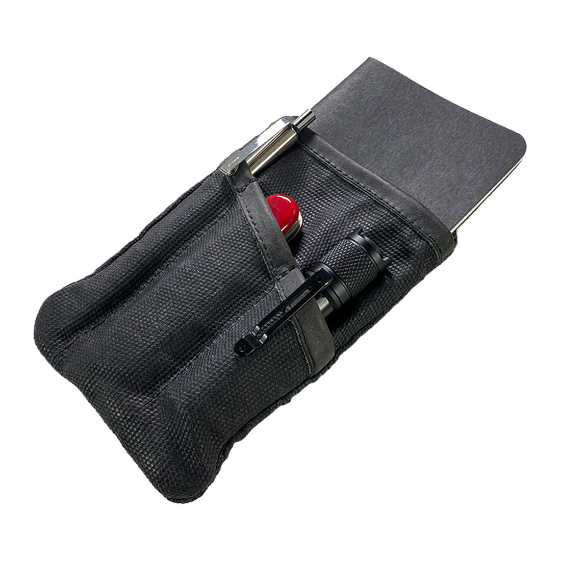 Multi-tool Pocket Pouch by Hide & Drink in black, highlighting its compact design and versatility as a slim organizer, crafted with attention to detail in La Antigua Guatemala.