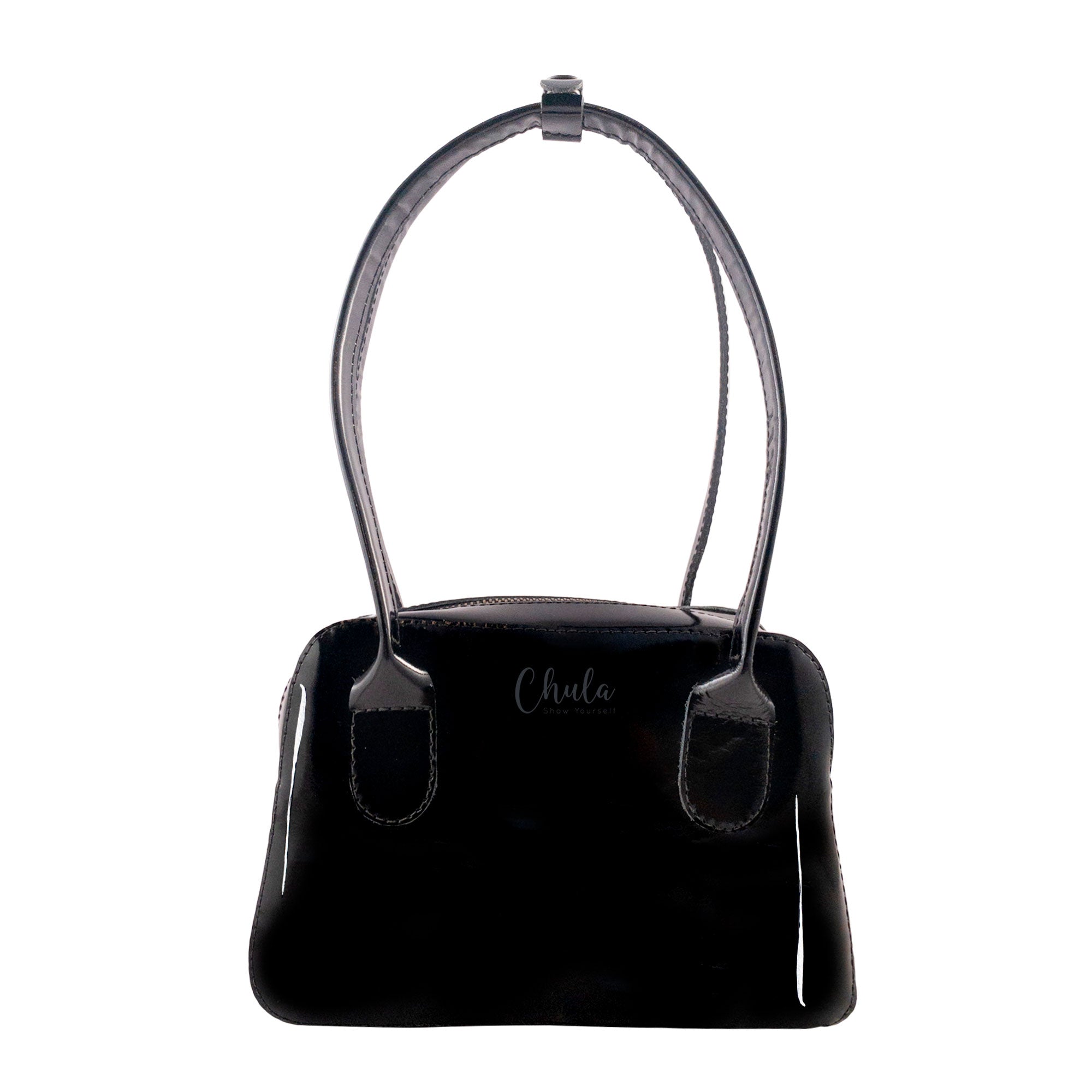 Chula Top-Handle Handbag displayed elegantly, showcasing its sophisticated design and high-quality Full Grain Leather, ideal for women seeking a stylish Female Tote with Zipper Closure, perfect as a Carry-On Top-Handle Bag or an Evening Bag. Handmade in La Antigua Guatemala.