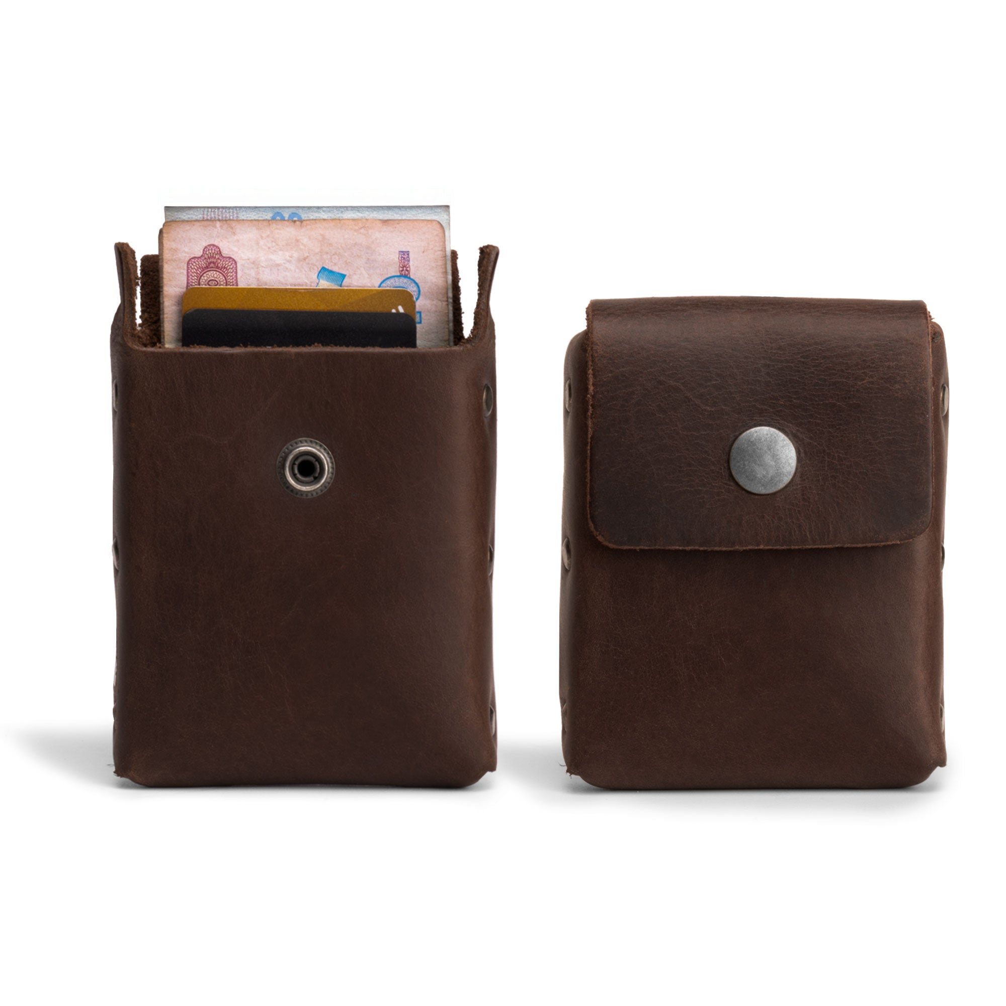 Hide & Drink's Waist Wallet designed for travel convenience, holds up to 20 cards, folded bills & coins, charging cables, made from full grain leather with small batch production, hand cut, hand sewn, fire branded, artisan craftsmanship, handmade in La Antigua Guatemala & Oaxaca Mexico.