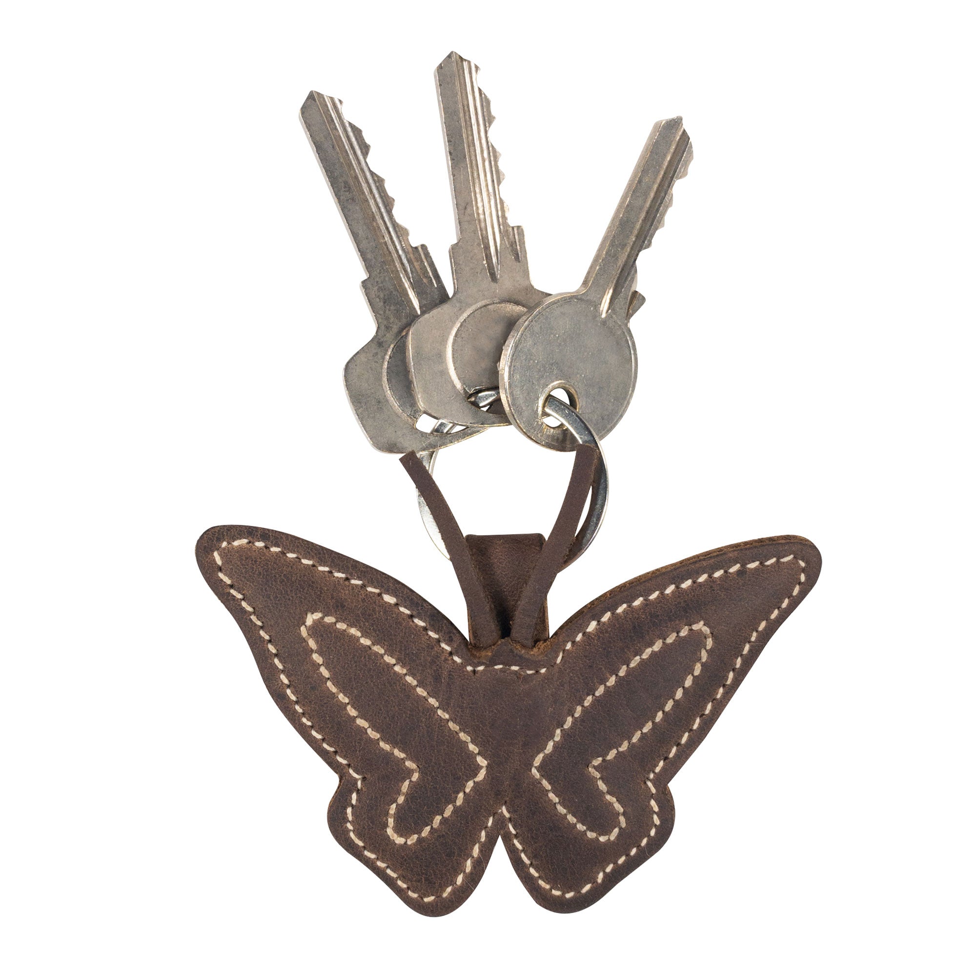 Butterfly Keychain by Hide & Drink featuring a unique full grain leather design, perfect for nature lovers. This hand cut, hand sewn key ring captures the essence of a flying insect and showcases artisan craftsmanship from La Antigua Guatemala & Oaxaca Mexico.