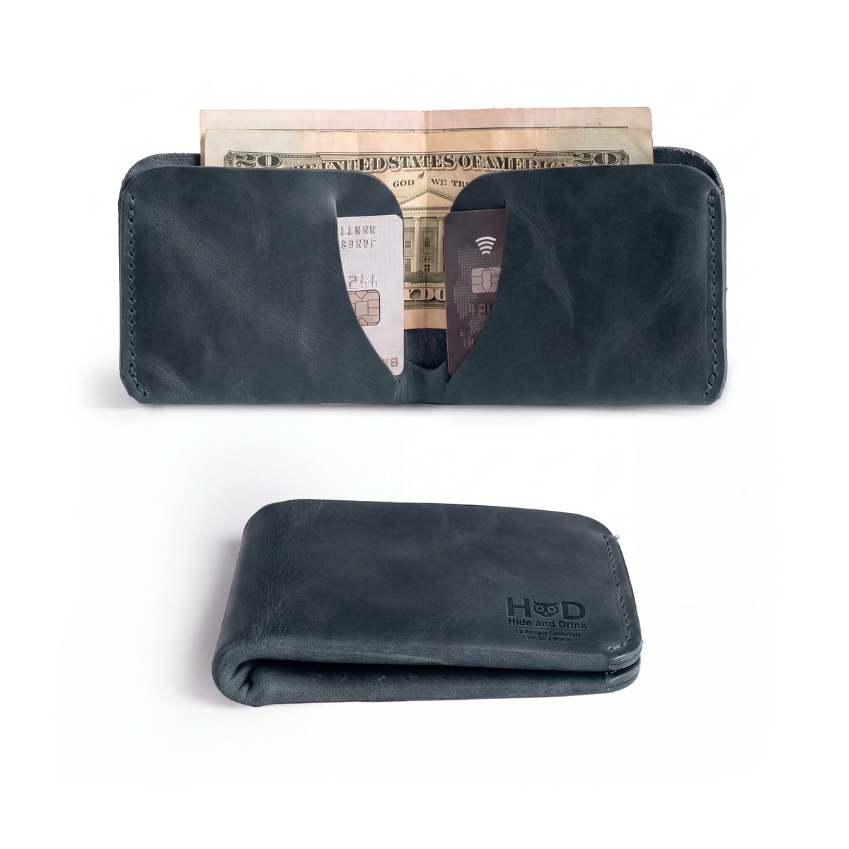 Front view of the Hide & Drink Minimal Wallet in deep blue, made with Full Grain Leather. This Classic Slimfold Wallet is an excellent Card Organizer Holder and Travel Accessory, showcasing the excellence of Small Batch Production with Hand Cut and Hand Sewn craftsmanship from artisans in La Antigua Guatemala & Oaxaca Mexico.