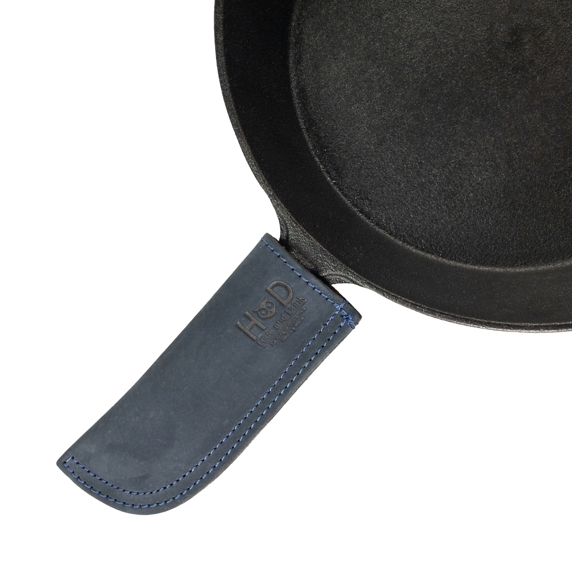 Hot Pan Handle Cover by Hide & Drink, designed to offer a sturdy grip for hot pans made from full grain leather, made with care in La Antigua Guatemala & Oaxaca Mexico.