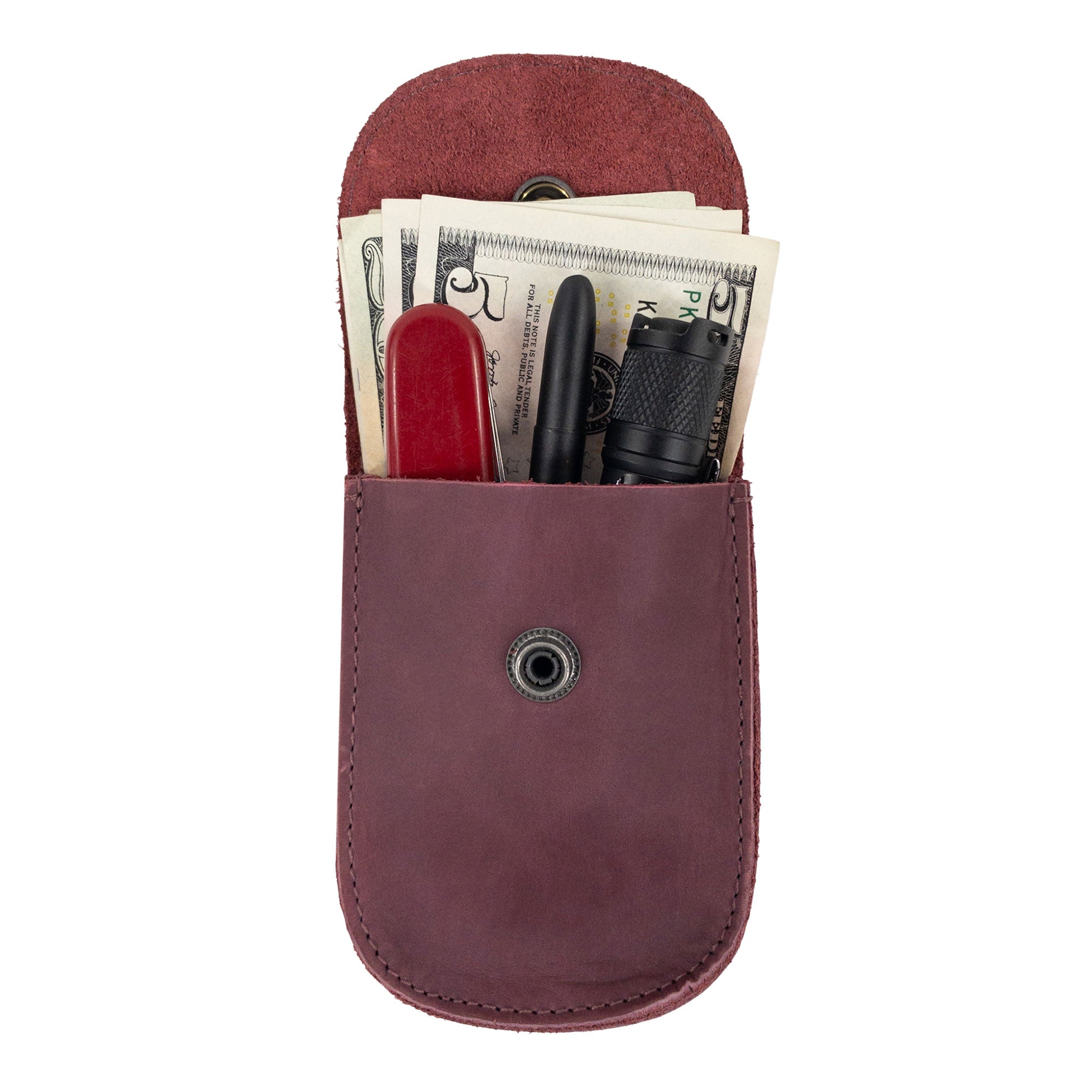 Side view of the Burgundy Holster Pouch by Hide & Drink, showcasing its sleek design and durable craftsmanship. This handmade pouch is perfect for organizing essential personal items.