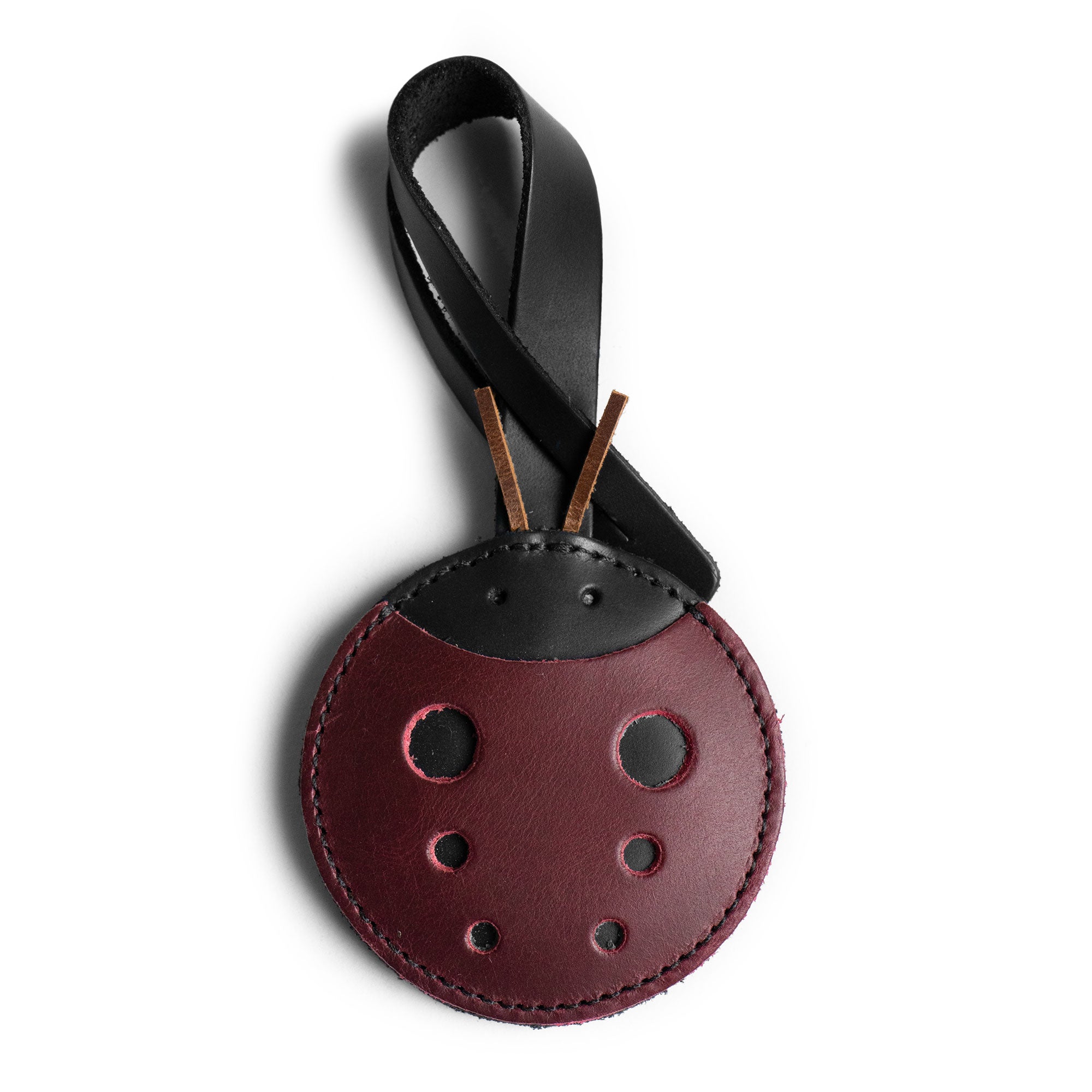 Hide & Drink Bag Charms featuring a cheerful pineapple design, making it an ideal charm for handbags. This purse charm for tote & backpacks is crafted from premium full grain leather, showcasing StockyardX's dedication to small batch production. Every piece represents meticulous hand cut, hand sewn craftsmanship alongside fire branding, handmade in La Antigua Guatemala & Oaxaca Mexico.