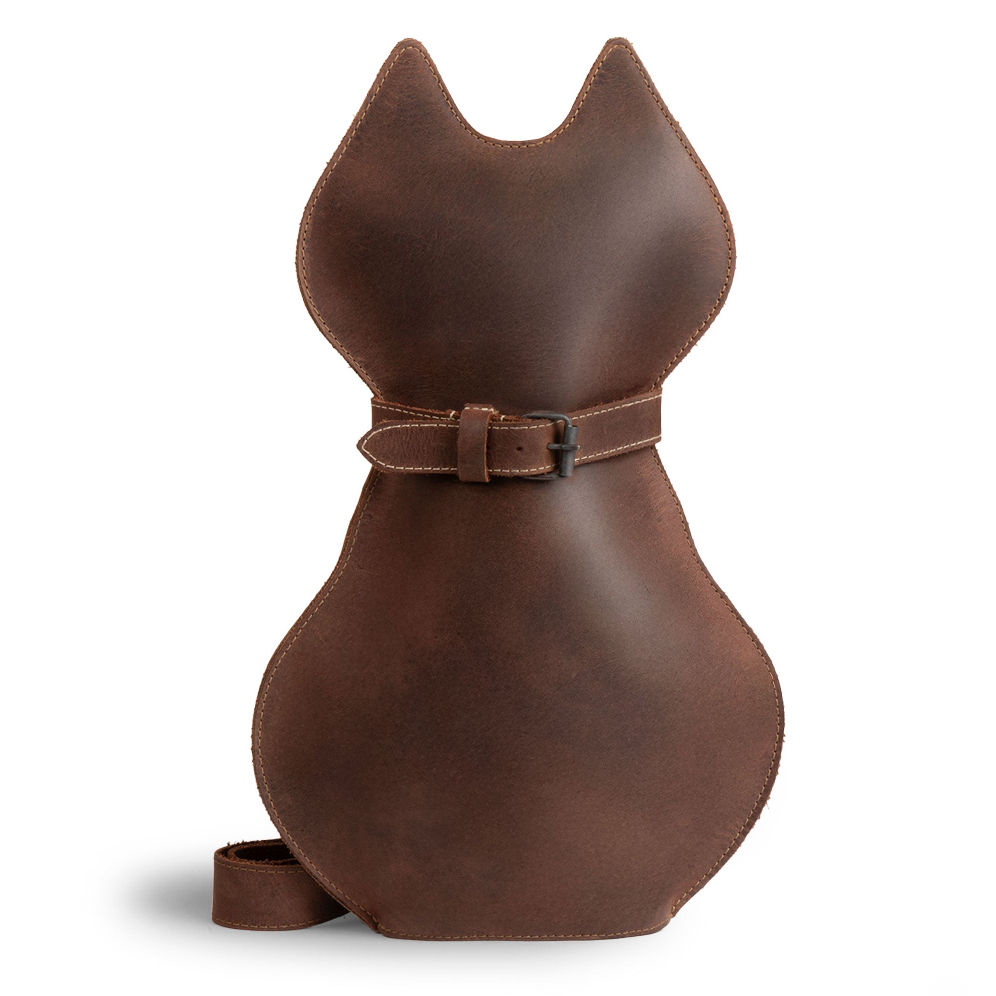 Stylish Kitty Shape Backpack by Hide & Play, crafted from full grain leather, perfect for pet lovers. This unique backpack is great for travel and everyday use. Handmade in La Antigua Guatemala, showcasing artisanal craftsmanship with hand cut and sewn details, making it a standout accessory.