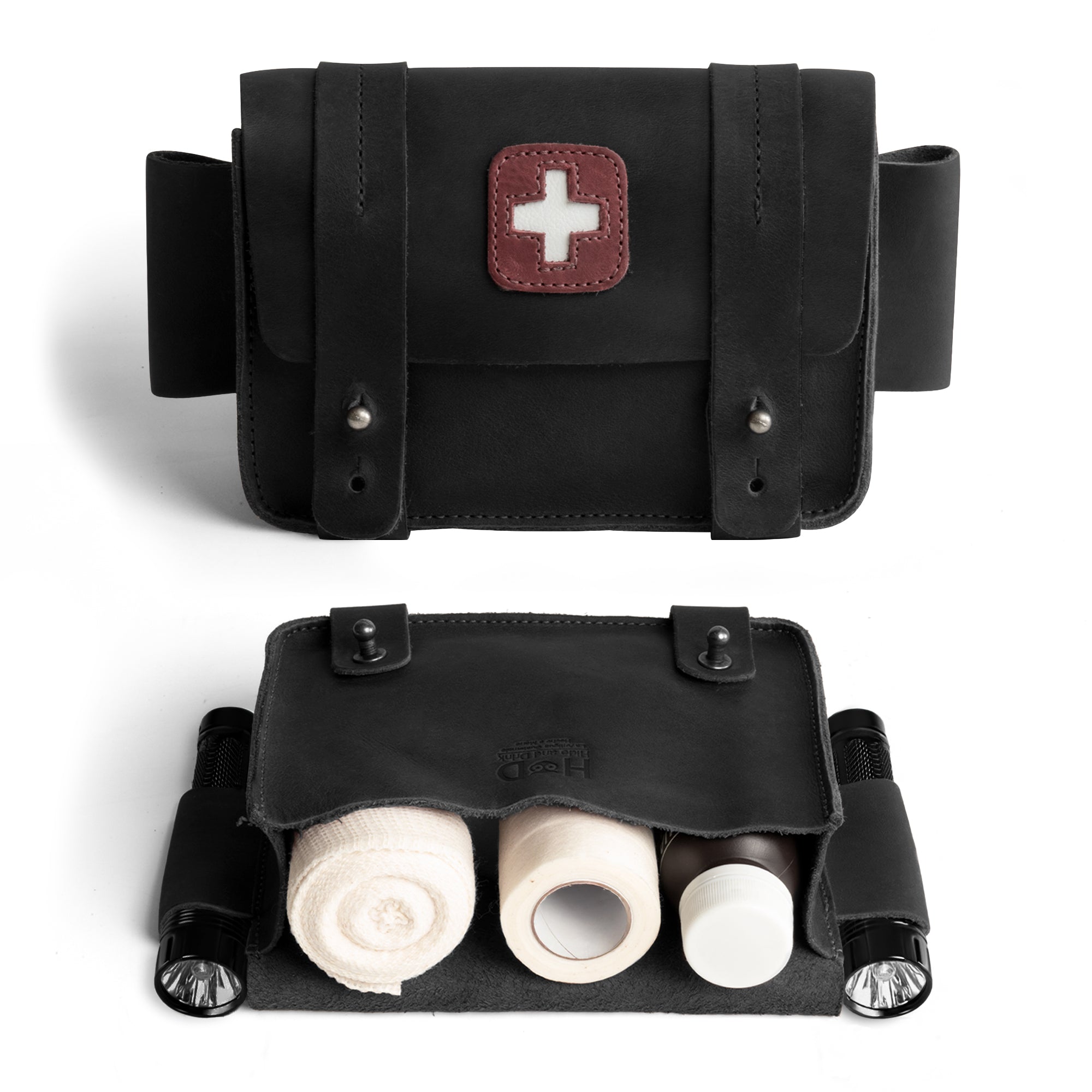 Hide & Drink's elegant black version of the Empty First Aid Bag, Mini Medical Storage Pouch, designed for practical use. This Empty First Aid Bag is perfect for organizing medical supplies on-the-go, made from durable Full Grain Leather with a handcrafted touch by artisans in La Antigua Guatemala.