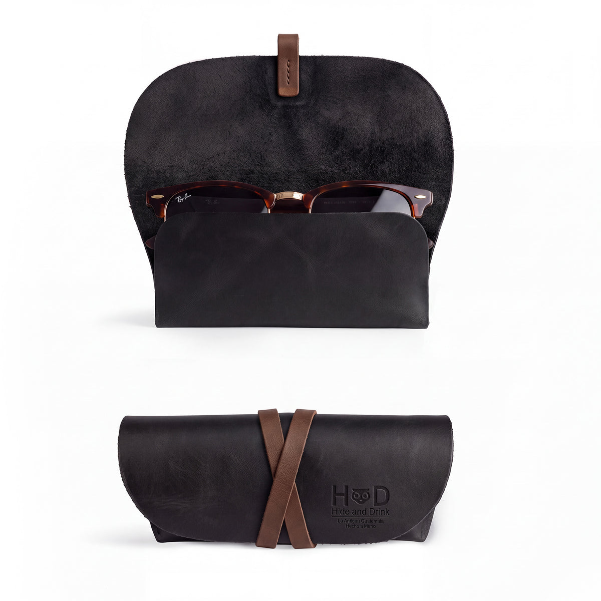 Hide & Drink Leather Sunglass Wrap showcases a unique design for sunglasses storage. Made from luxurious full grain leather, this eye glasses storage solution is perfect for travel, reflecting the artistry of small batch production.