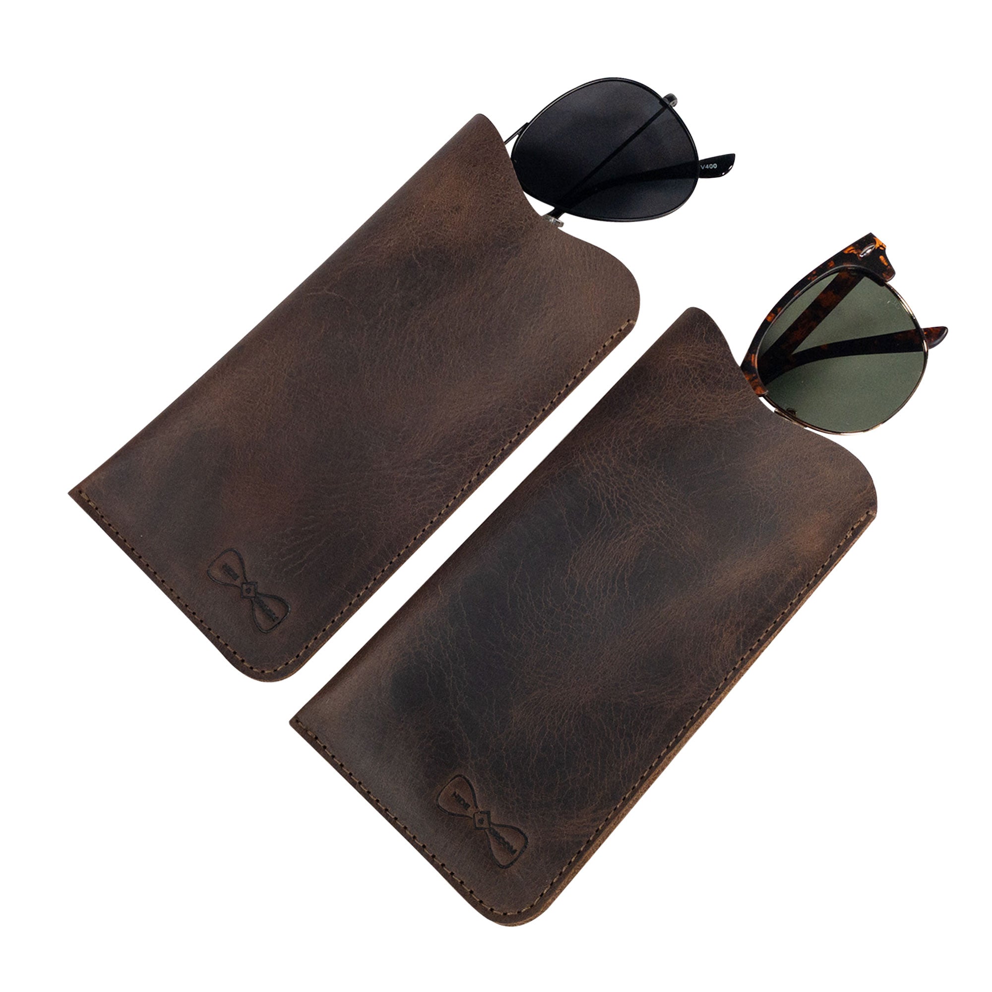 Hide & Groom Set of 2 Sunglasses Case showcasing two leather eyeglass sleeves, perfect for safe storage during travel. Ideal wedding accessories for men and women, crafted from full grain leather with a unique artisan touch, handmade in La Antigua Guatemala & Oaxaca Mexico.