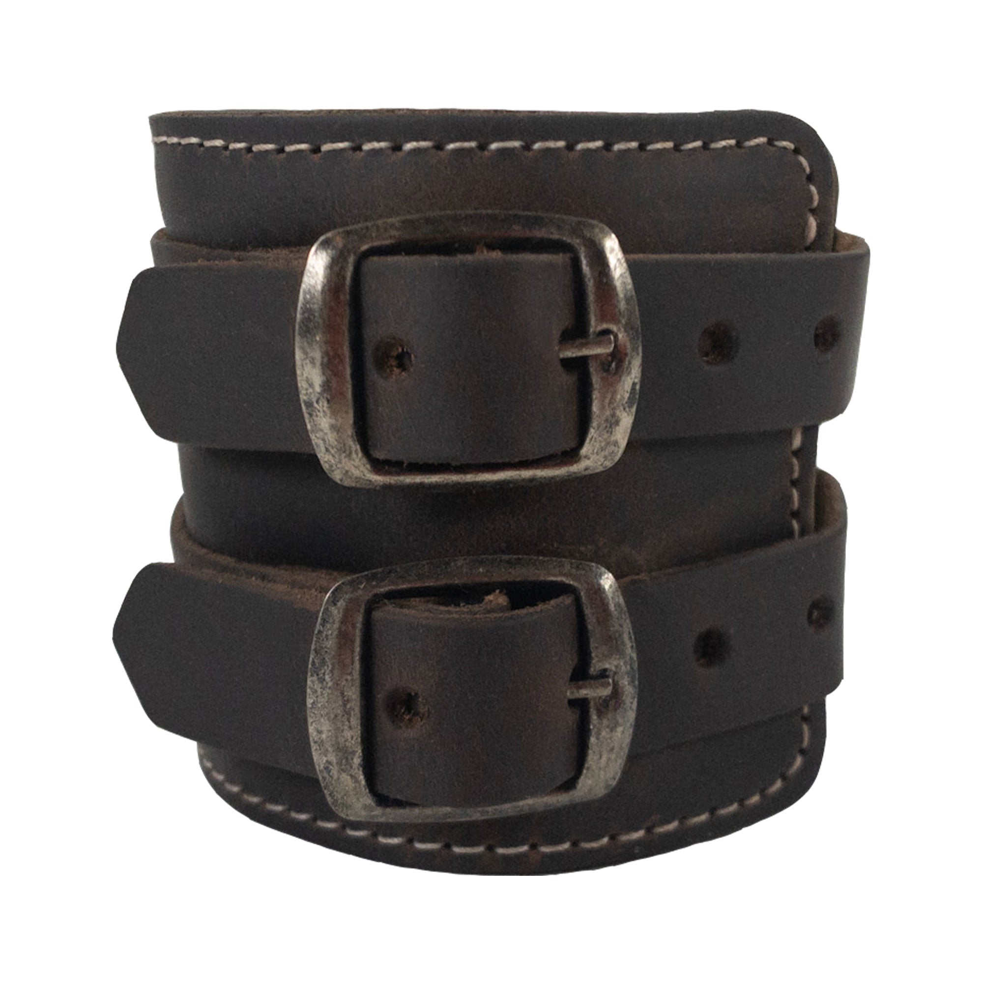 A stylish portrayal of Hide & Drink's Wrist-Wallet-Cuff made from quality Full Grain Leather. This rustic leather bracelet includes a hidden pouch for bills and an inner zippered pouch, functional for easy access. Each piece is handmade in La Antigua Guatemala & Oaxaca Mexico, honoring artisan traditions.