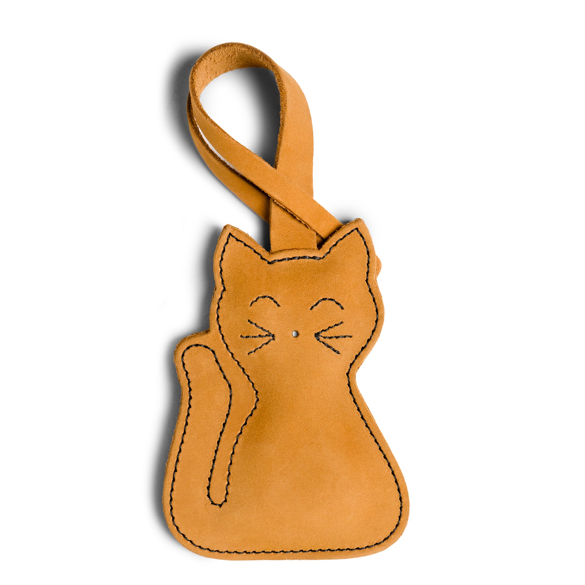Hide & Drink Bag Charms showcasing a whimsical nose design, a charming accessory for handbags. This purse charm for tote & backpacks made from durable full grain leather emphasizes StockyardX's dedication to small batch production. Each piece features hand cut, hand sewn artistry and fire branding, handmade in La Antigua Guatemala & Oaxaca Mexico.