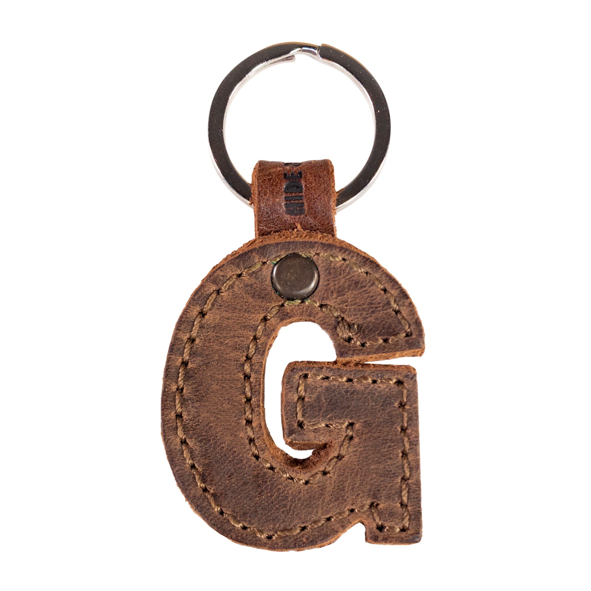 Stylish 'J' thick leather Alphabet Letter Keychain from Hide & Drink, ideal for personalizing your keys. Artisan-quality craftsmanship showcased in La Antigua Guatemala.