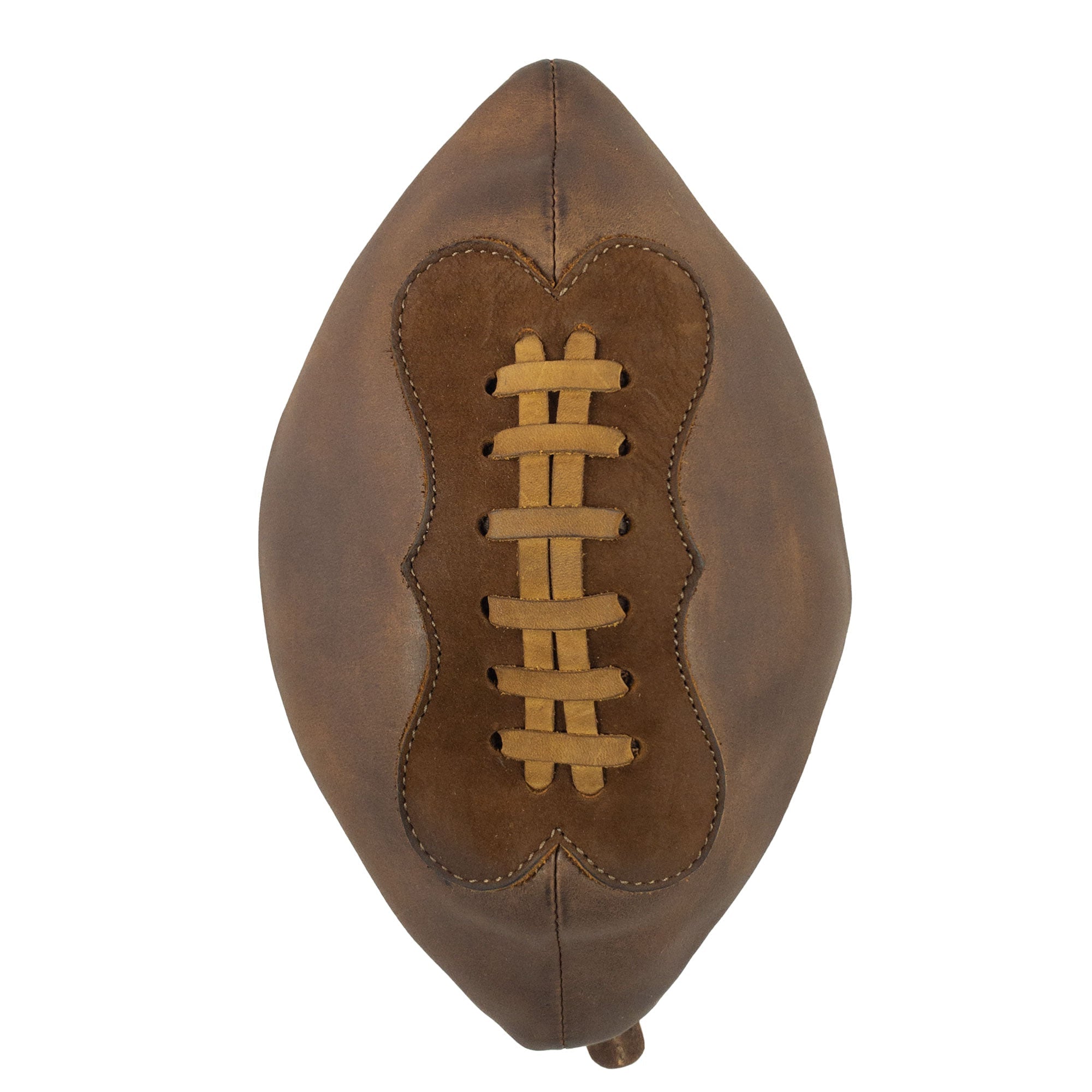 Top view of the handmade Football Toiletry Bag by Hide & Drink, showcasing its rustic design featuring full grain leather and suede details. This Gameday Football Dopp Toiletry Bag serves as a stylish travel organizer and a durable bag for grooming essentials, perfect for shaving kit storage. Crafted with care in La Antigua Guatemala, this artisan-made piece exemplifies small batch production with hand-cut and hand-sewn techniques.