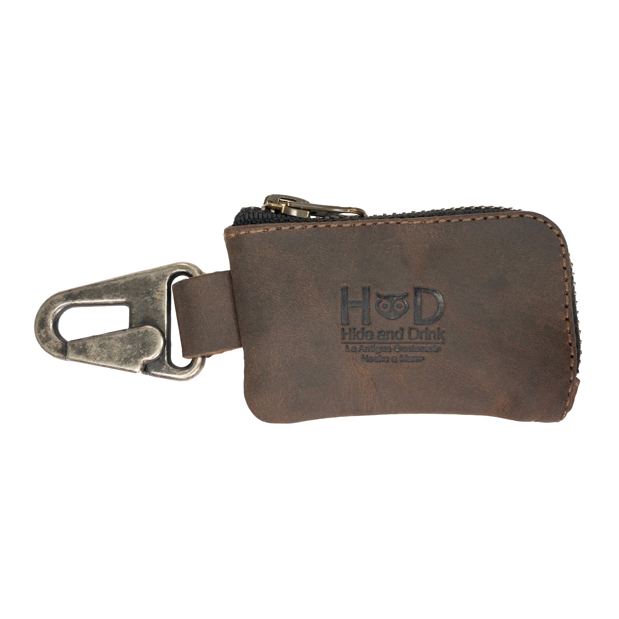 Hide & Drink's Car Key Holder showcasing rustic full grain leather design with nickel metal clasp, perfect for securely storing keys, cash, and cables. Ideal as a gift and handmade in La Antigua Guatemala & Oaxaca Mexico.