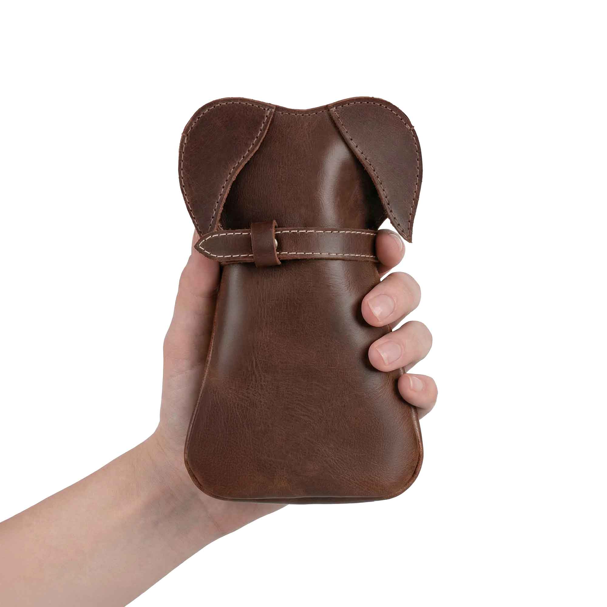 Leather Doggy Pouch by Hide & Play, showcasing a handmade Leather Doggy-Shaped Coin Pouch Piggy Bank. This Cash Holder Organizer is crafted from Full Grain Leather, perfect for both men and women as a stylish Coin Purse, Money Saving Box, and Men's Change Purses & Pouches. Ideal as a Small Mens Wallet for Coins, featuring exquisite handmade craftsmanship from La Antigua Guatemala and Oaxaca Mexico.