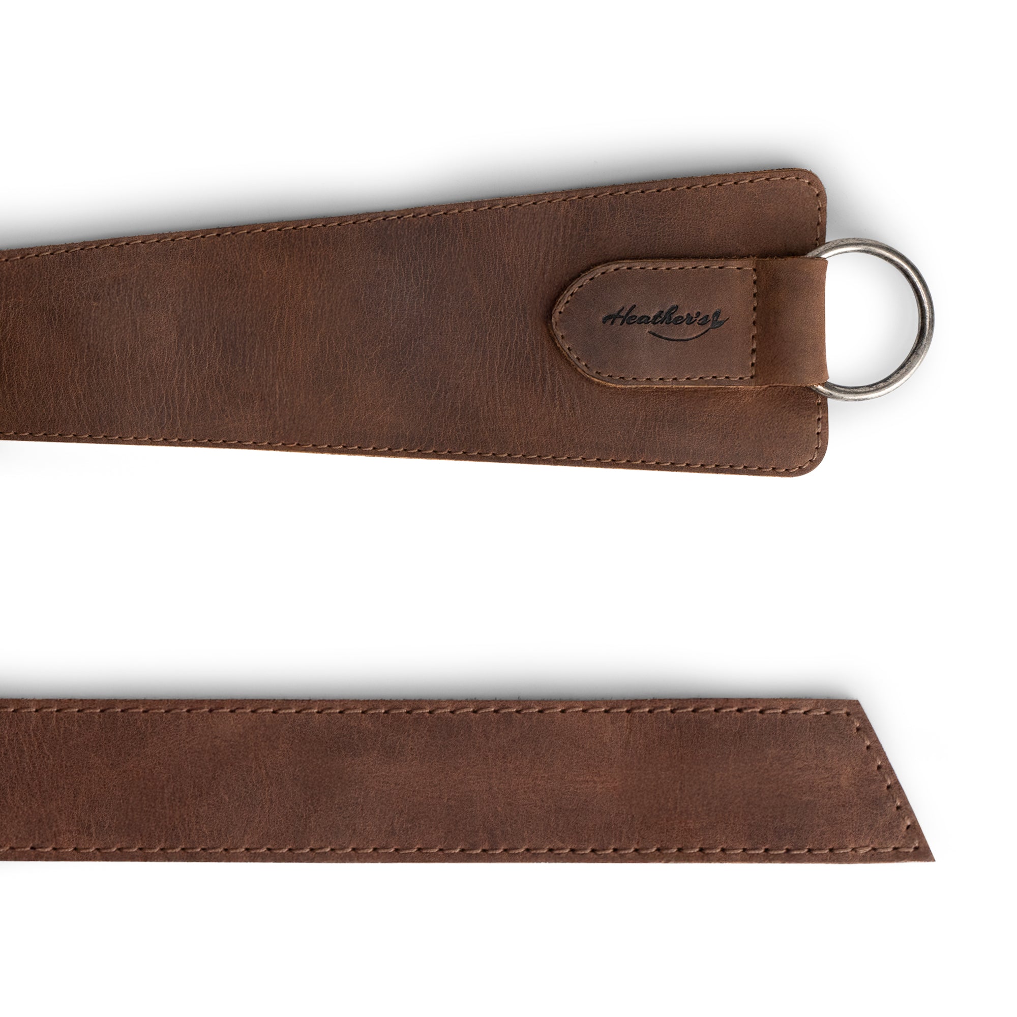 Heather's sleek Formal Belt for Women with Ring in brown, designed for comfort and style. This Full Grain Leather waist strap serves as a chic belly accessory and exemplifies small batch artisan production, hand cut and fire branded in La Antigua Guatemala.