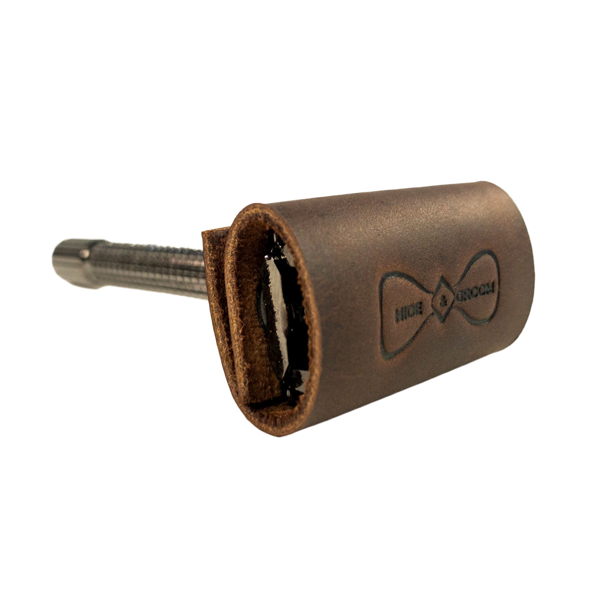 Innovative Set of 2 Double Edge Safety Razor Head Protective Sheath by Hide & Groom, designed to protect razors while traveling. This full grain leather sheath is perfect for groomsmen, featuring a snap closure for convenience. StockyardX, small batch production, hand cut, hand sewn, fire branded, artisan, handmade in La Antigua Guatemala & Oaxaca Mexico.