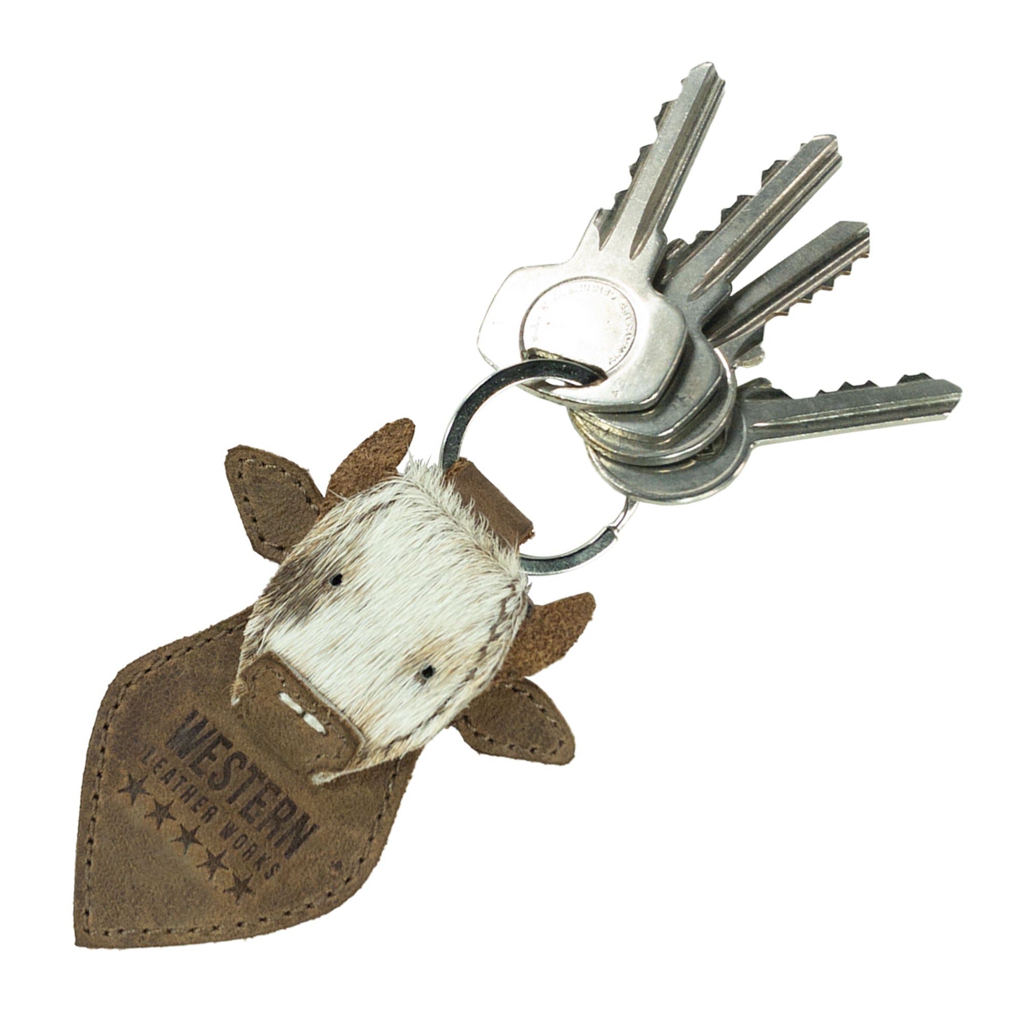This Cow Head Keychain from Western Leather Works is not only a practical key organizer but also a charming cowboy style keyring. Crafted from high-quality full grain leather, this handmade accessory reflects the artisan craftsmanship of La Antigua Guatemala, making it a unique addition to your collection.