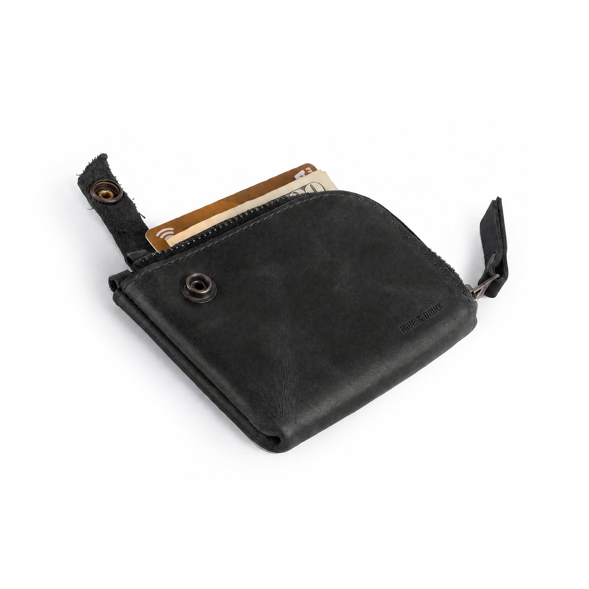 Black Lion's Mane Zippered Wallet by Hide & Drink, delivering stylish organization for cash and cards. An essential pouch organizer made from durable full grain leather.
