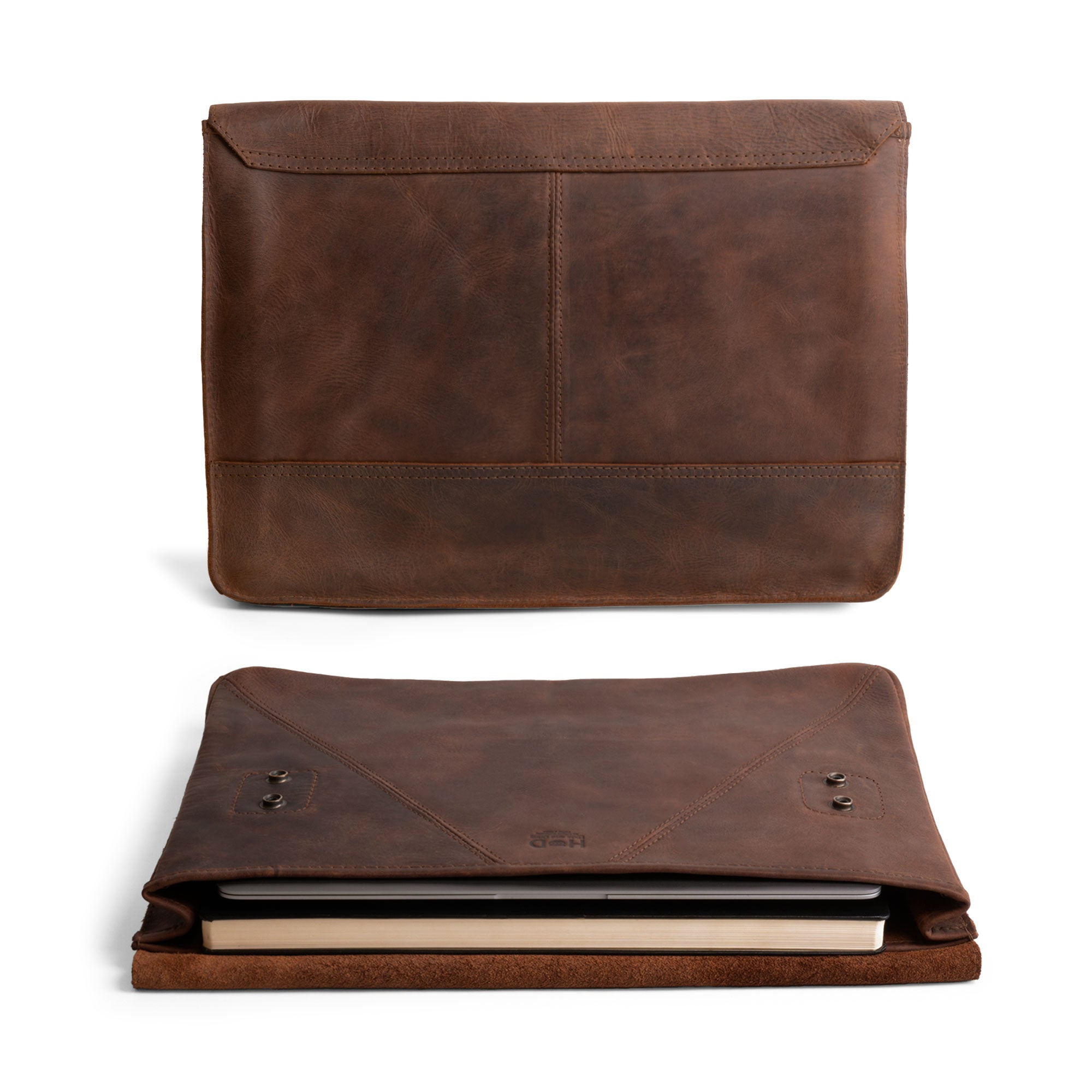 Classic leather work featuring Hide & Drink's Vintage Folder Holder XL, designed for strength and style with Full Grain Leather. This handcrafted folder is perfect for documents, contracts, or as a stylish padfolio. Every piece is artisan-made in La Antigua Guatemala & Oaxaca Mexico, showcasing small batch production techniques.