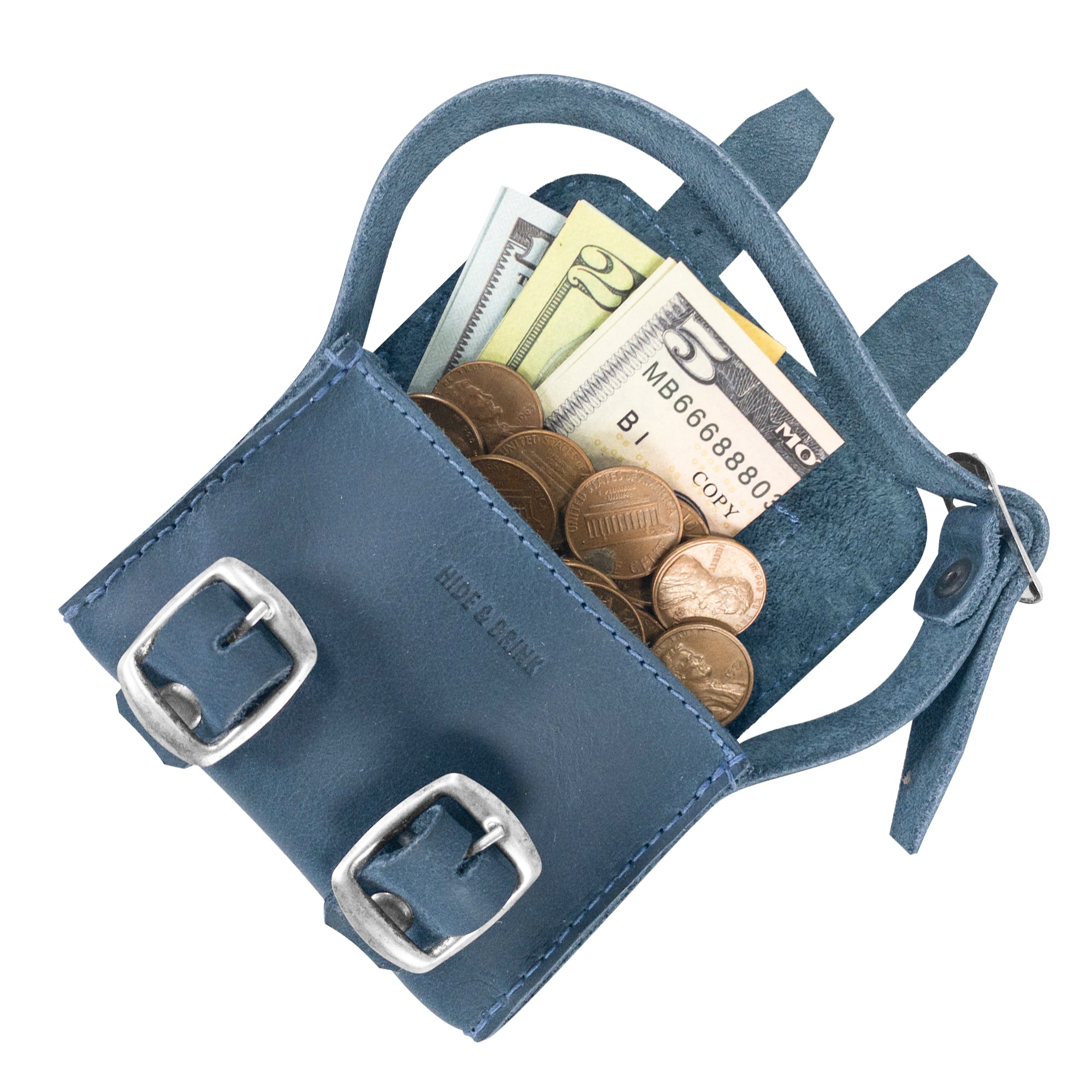 Inside view of the deep blue Tiny Messenger Bag by Hide & Drink, featuring a spacious compartment for cash and coins. This lovely Mini Messenger Bag Charm made from Full Grain Leather serves as an excellent keychain or fashionable handbag accessory, crafted by artisans in La Antigua Guatemala.