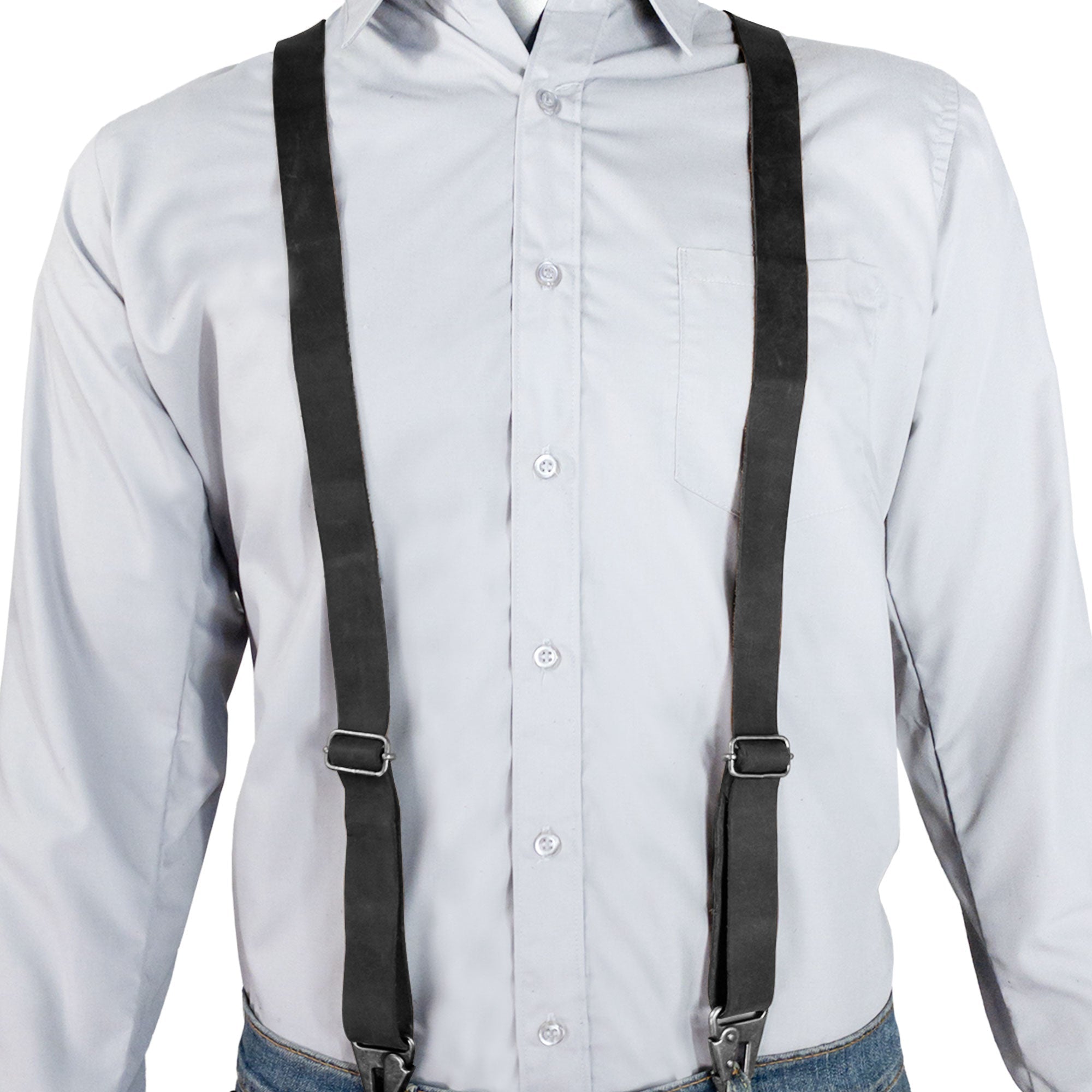 Model wearing black Drop Shaped Suspenders by Hide & Groom, showcasing the Full Grain Leather and adjustable size straps for men; elegantly handcrafted from La Antigua Guatemala & Oaxaca Mexico.