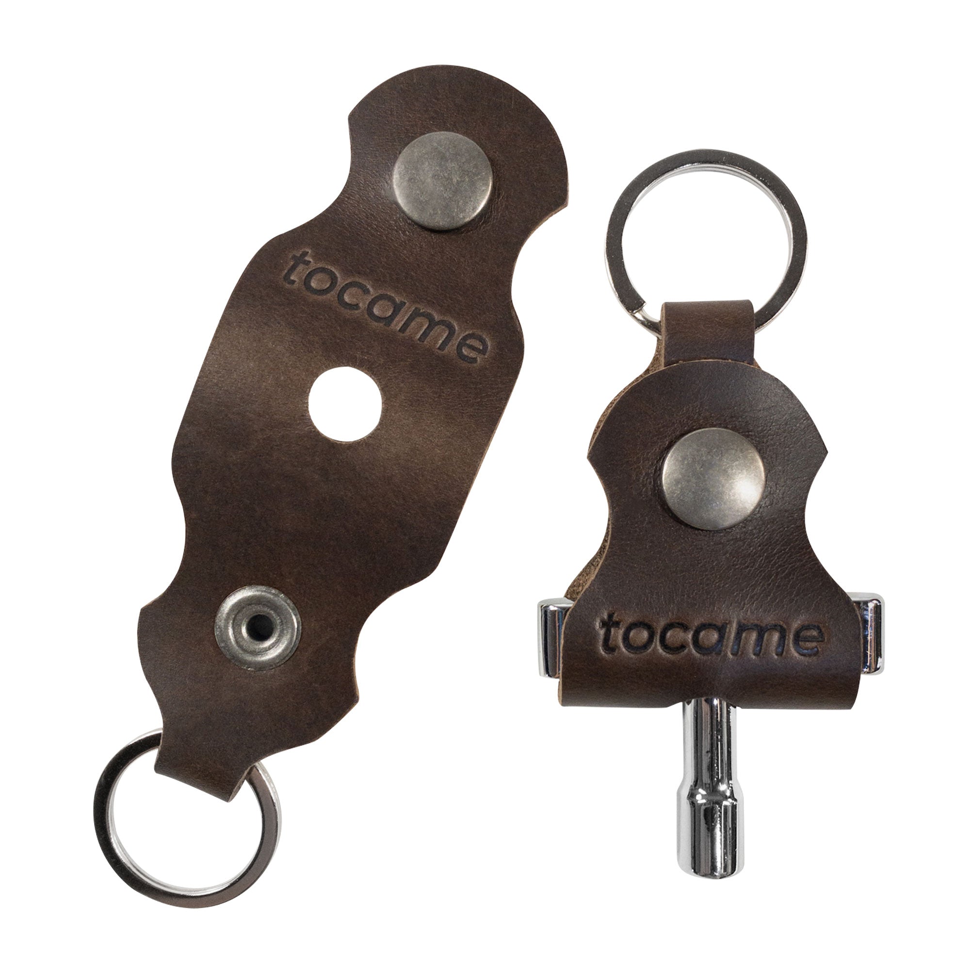 Individual keychain from tocame showcasing the design of the Set of 2 Keychains for Drum Tunners (Not Included). This key organizer is made from premium full grain leather, perfect for drummers looking for a classic accessory. Crafted with care, these keychains are handmade, fire branded, and represent the quality of small batch production.