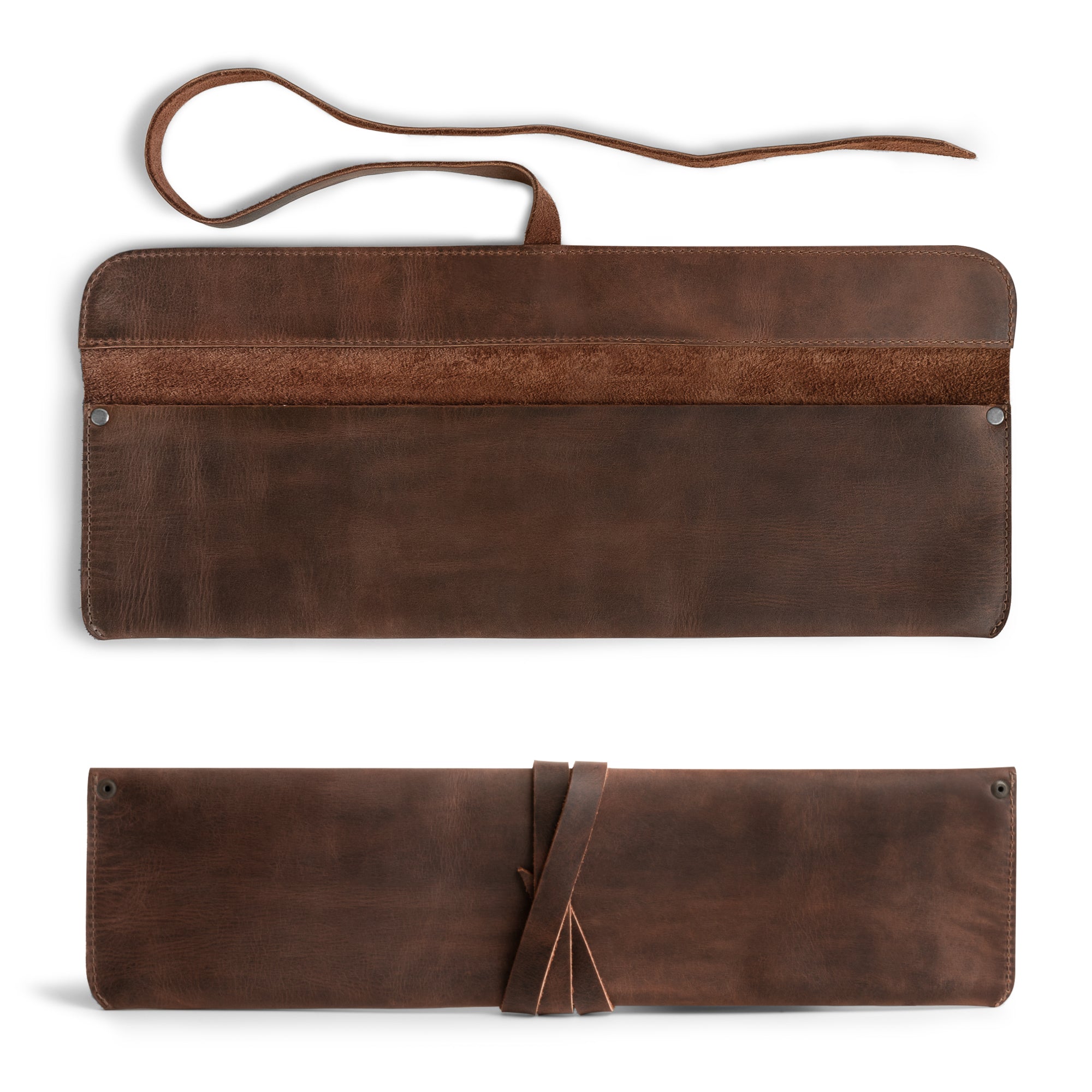 Cast Leather Co. Single Leather Knife Case in an elegant brown finish, displaying the internal leather compartment. This stylish kitchen small storage bag is perfect for keeping knives safe while traveling. Hand cut and hand sewn using quality full grain leather in La Antigua Guatemala, it makes a wonderful choice for chefs who appreciate a combination of function and style.