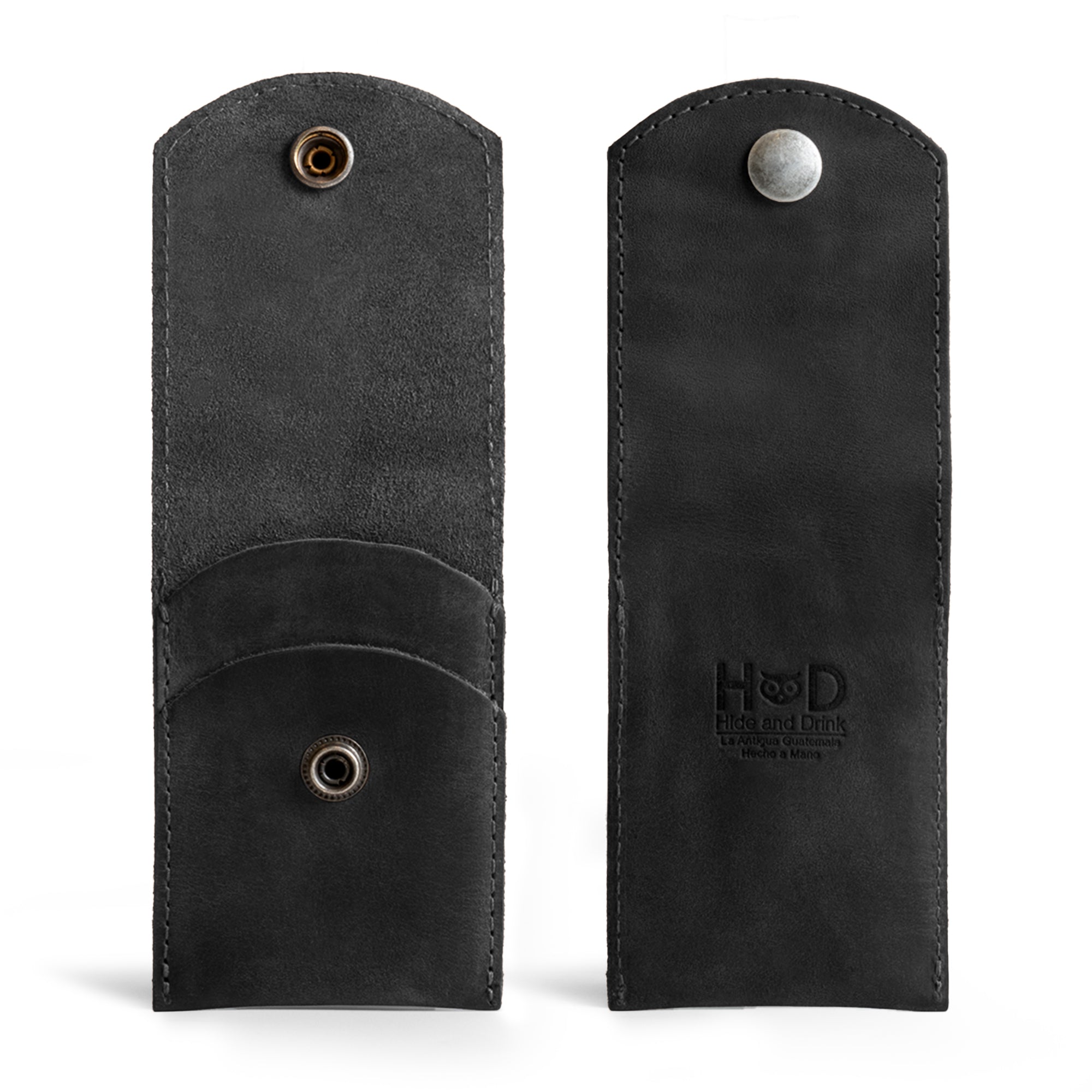 Back view of Hide & Drink Nail Clipper Case in black leather, emphasizing its simple yet functional design. Ideal as a travel accessory for grooming, this artisanal product is hand cut, hand sewn, fire branded, and proudly crafted in La Antigua Guatemala & Oaxaca Mexico.