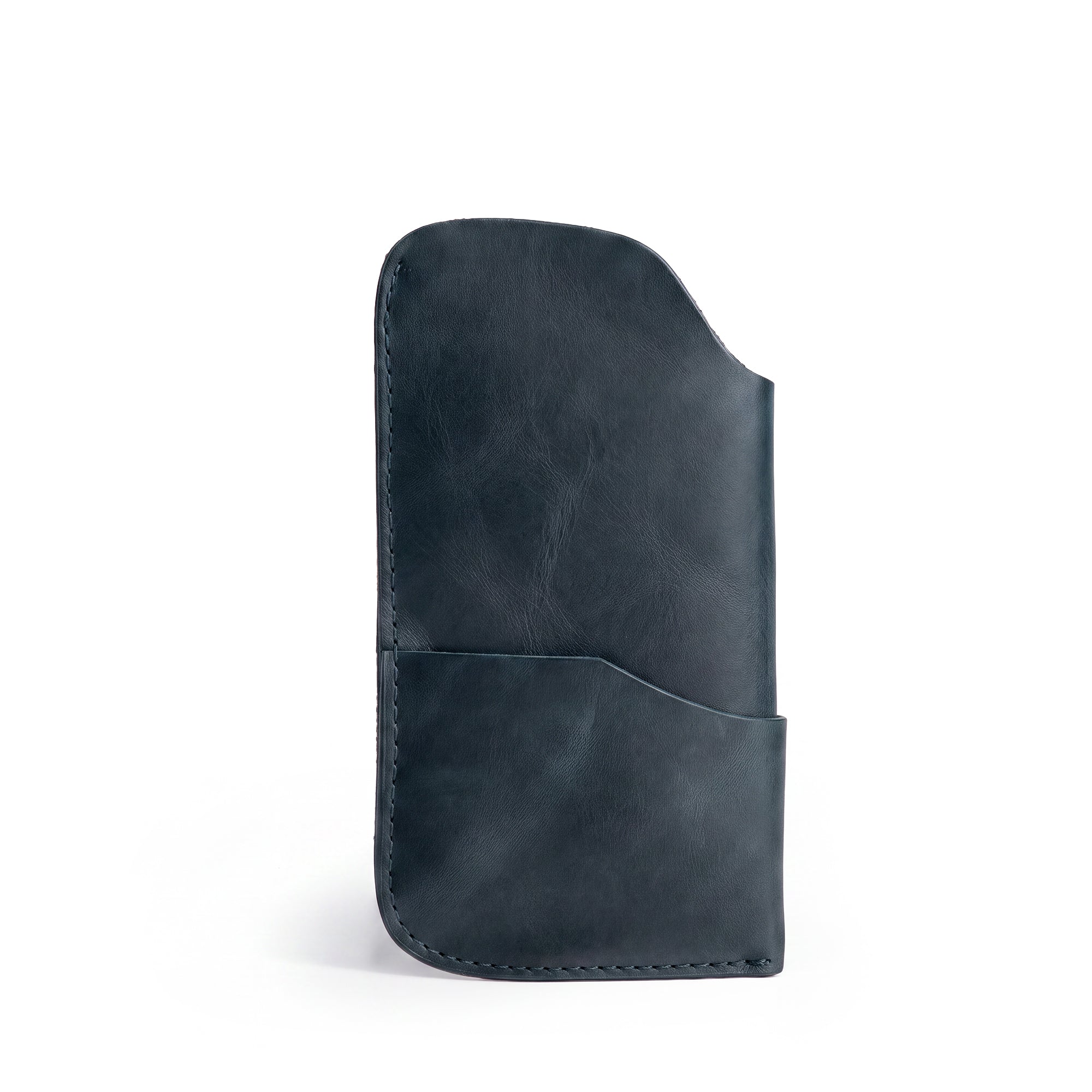 Feature angle of the Hide & Drink Sunglass Case & Wallet in navy, displaying its refined style. This Rustic Sunglasses Case & Wallet offers optimum protection for your eyeglasses, crafted from Full Grain Leather and perfect for travel, artisan-made in La Antigua Guatemala & Oaxaca Mexico.