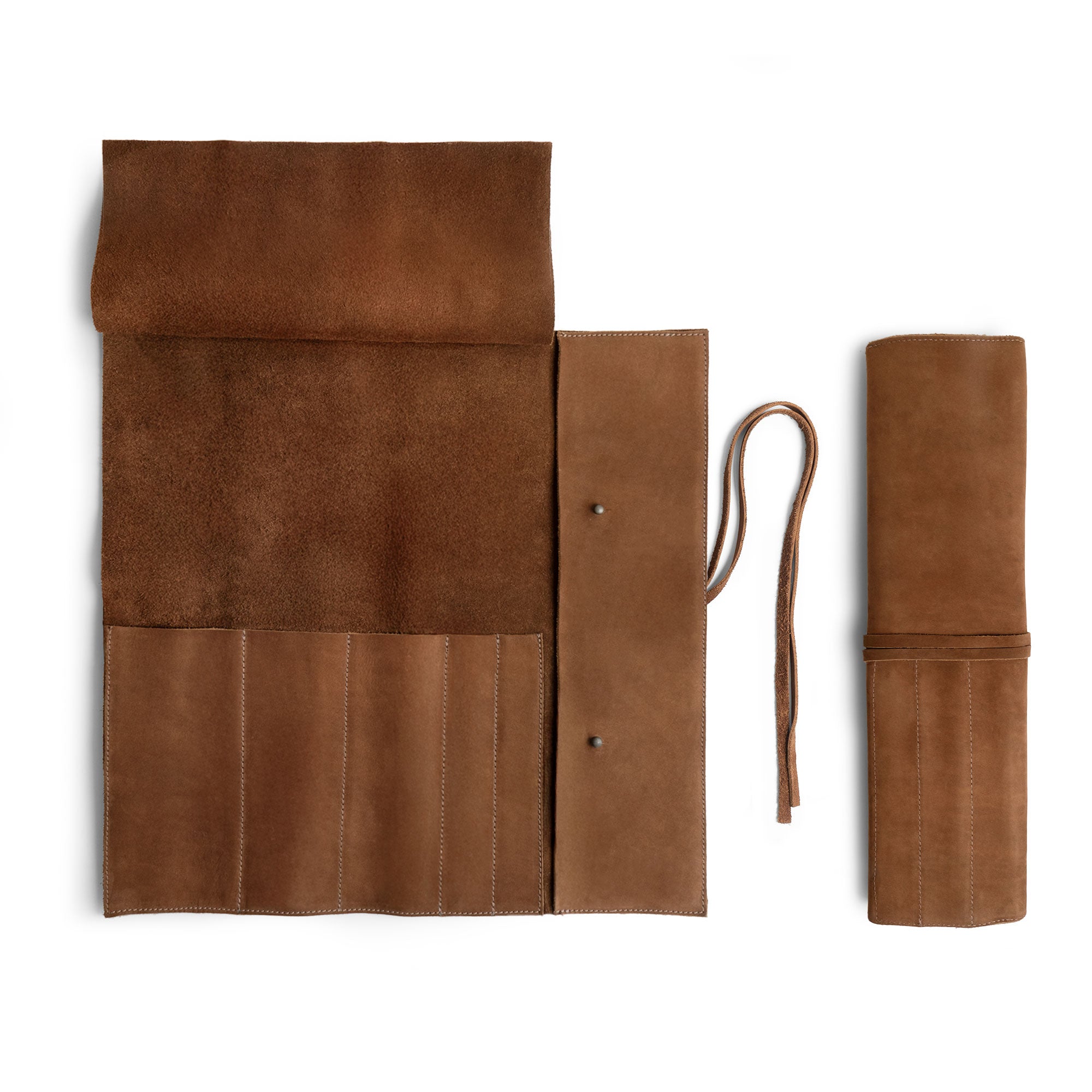 Hide & Drink Knife Roll (5 Pockets) showcasing a spacious interior made of Full Grain Leather, ideal for chefs. This Chef Knife Bag serves as a portable carrying case for knives, highlighting handmade quality with artisan touches from small batch production, hand cut, and hand sewn components.
