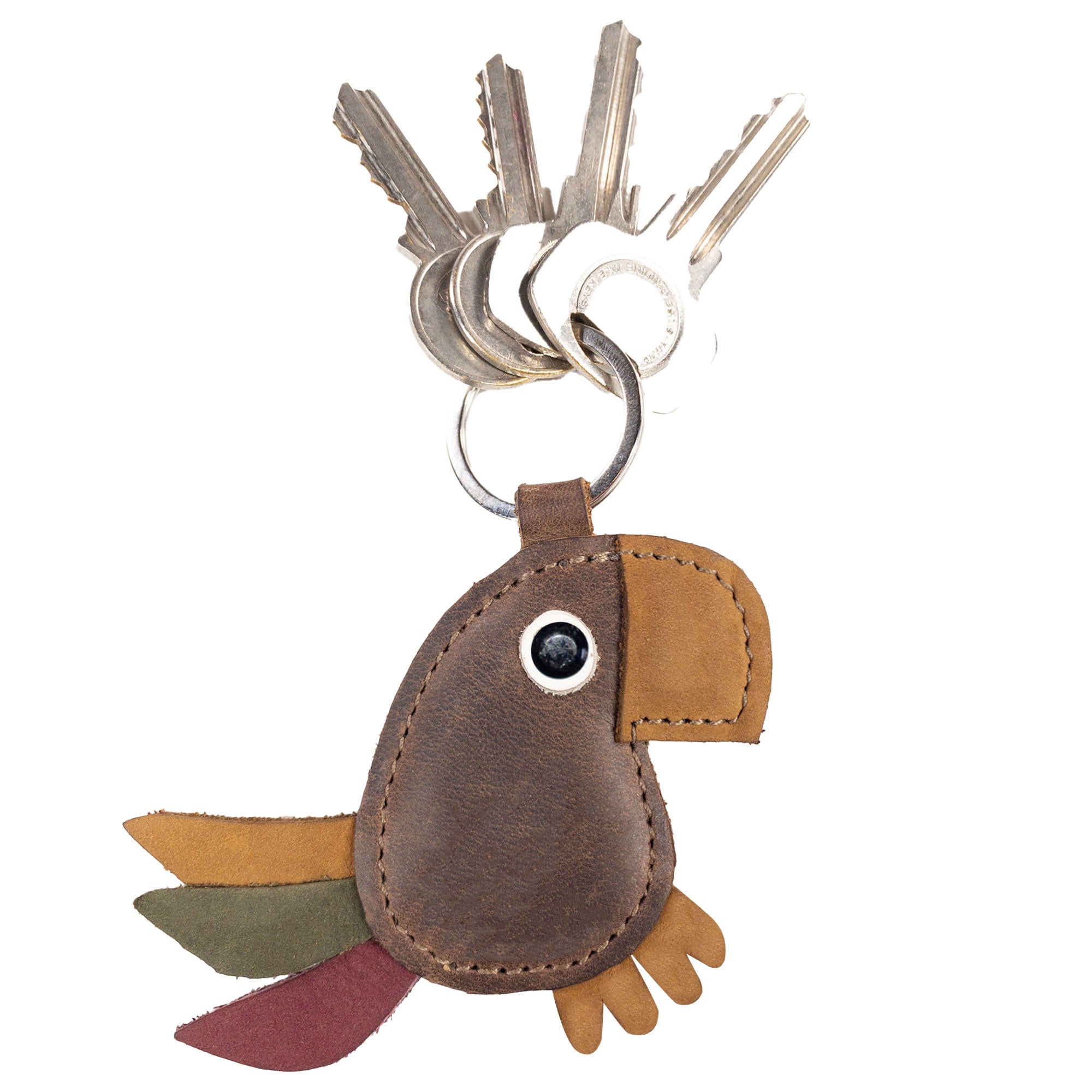 Hide & Drink's Toucan Keychain featured with keys, made from full grain leather. This stylish animal-shaped keyring serves as a unique ornament for your backpack or handbag. Artisan crafted in La Antigua Guatemala & Oaxaca Mexico, it highlights small batch production with hand cut and hand sewn details.